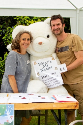 Volunteers Laura & Tim with Name the Teddy