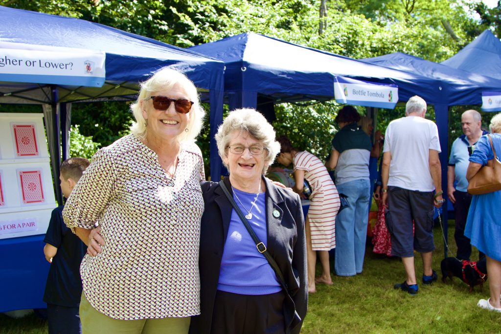 Patron Lady Barbara and former Swanley Mayor, and good friend of the Centre, Rita Wood pose in front of stalls at the Summer Fete.
