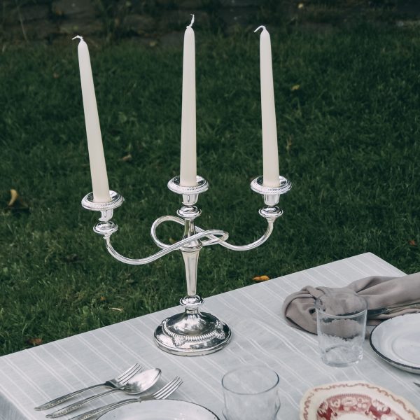 Three-armed silver candelabra