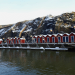 Lindholmen in winter (Gothenburg) with red boathouses.