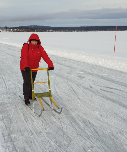 Heidi is using a spark on the ice in Västerbotten, Sweden.
