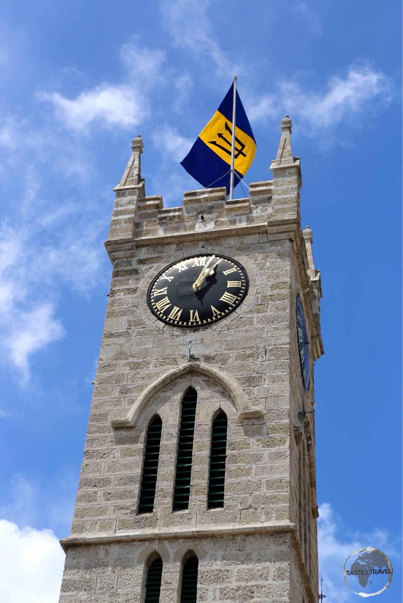 The coral-limestone clock tower of the Parliament Building, Bridgetown, Barbados.