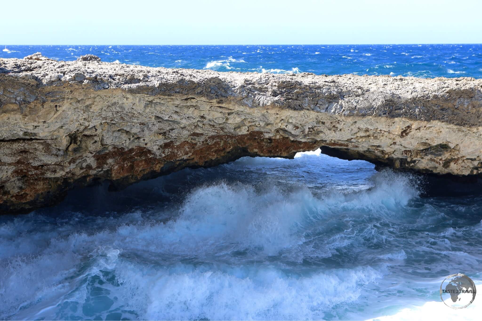 Curaçao Travel Guide: Natural limestone bridge in Shete Boka National Park, Curaçao.