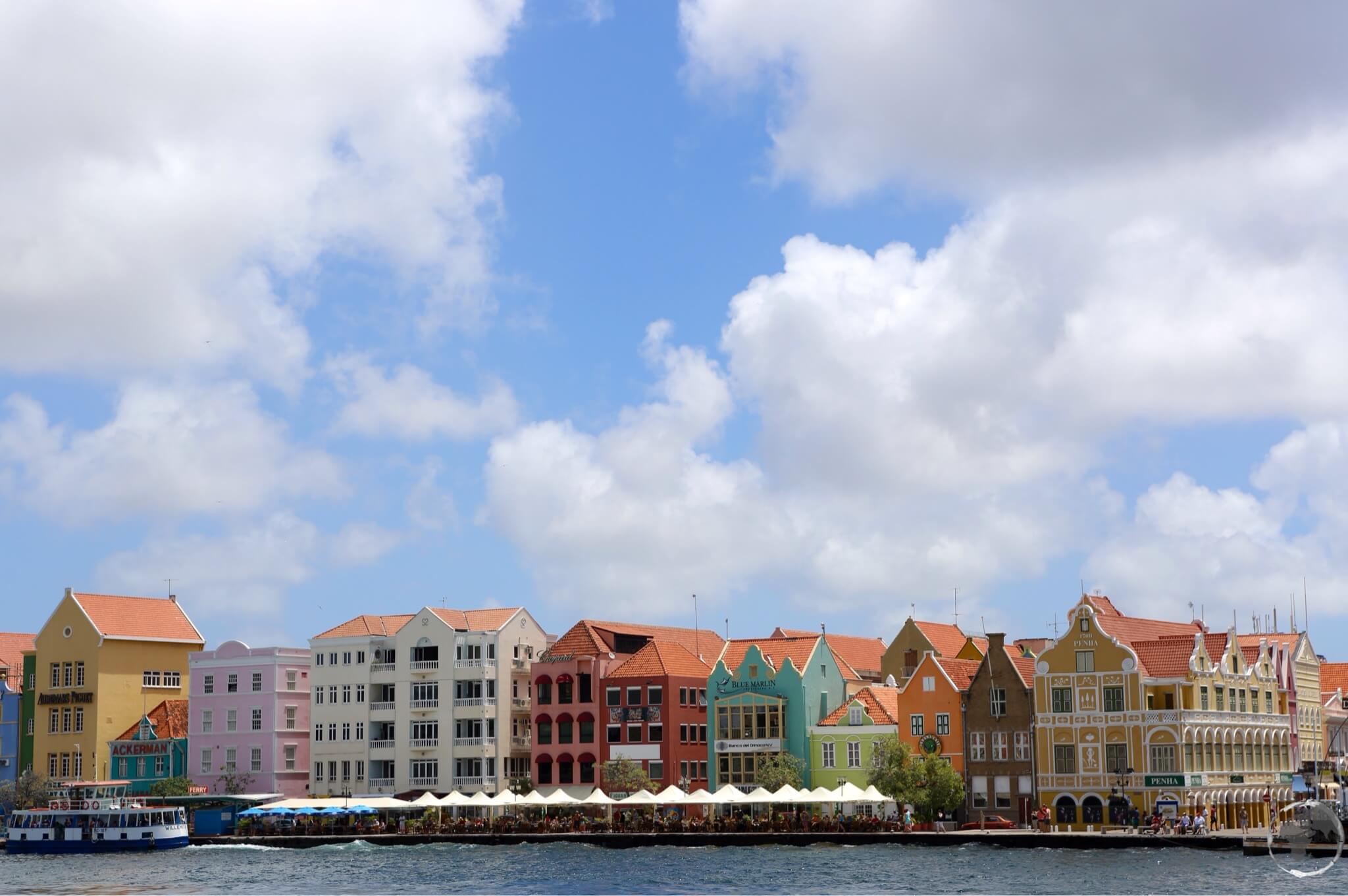 Colourful Dutch-style buildings line the iconic Handelskade in Willemstad, the capital of Curaçao. 