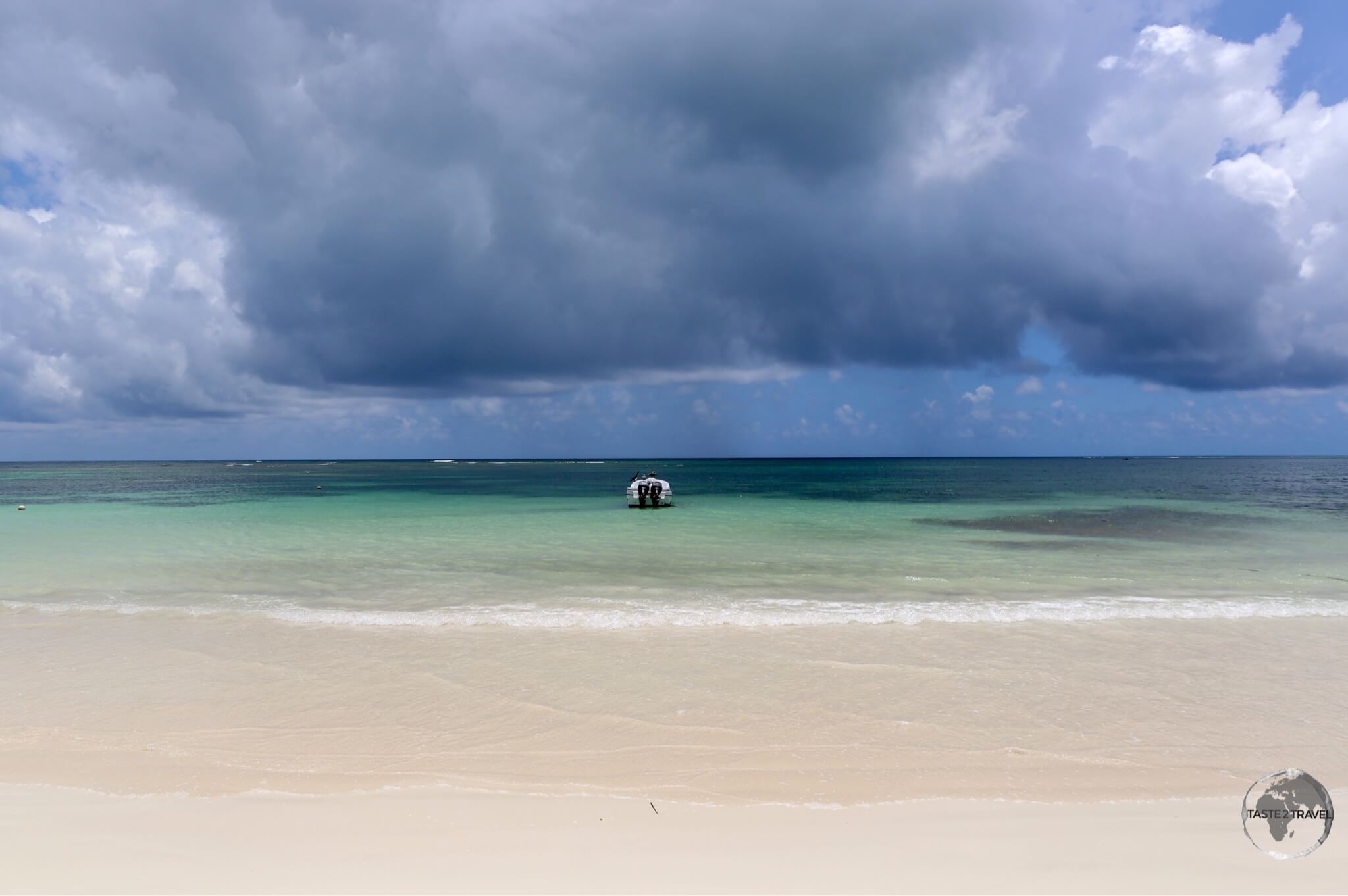 Stormy skies over the beach at Las Terrenas, which lies on the north-east coast of the Dominican Republic. 