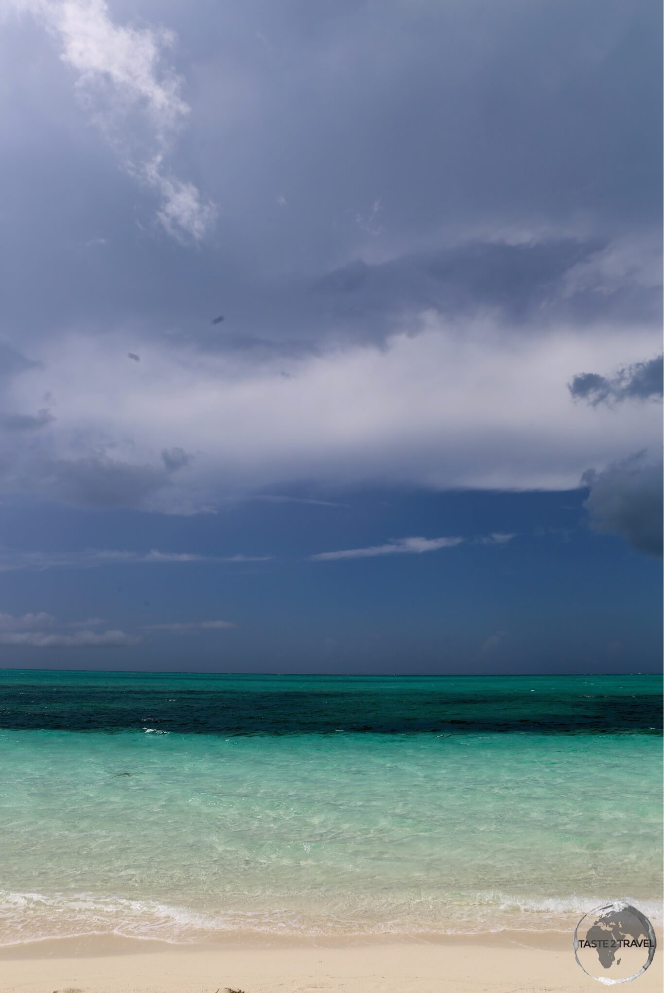 Stormy skies over ‘The Bight' beach, one of the best beaches on Provo island.