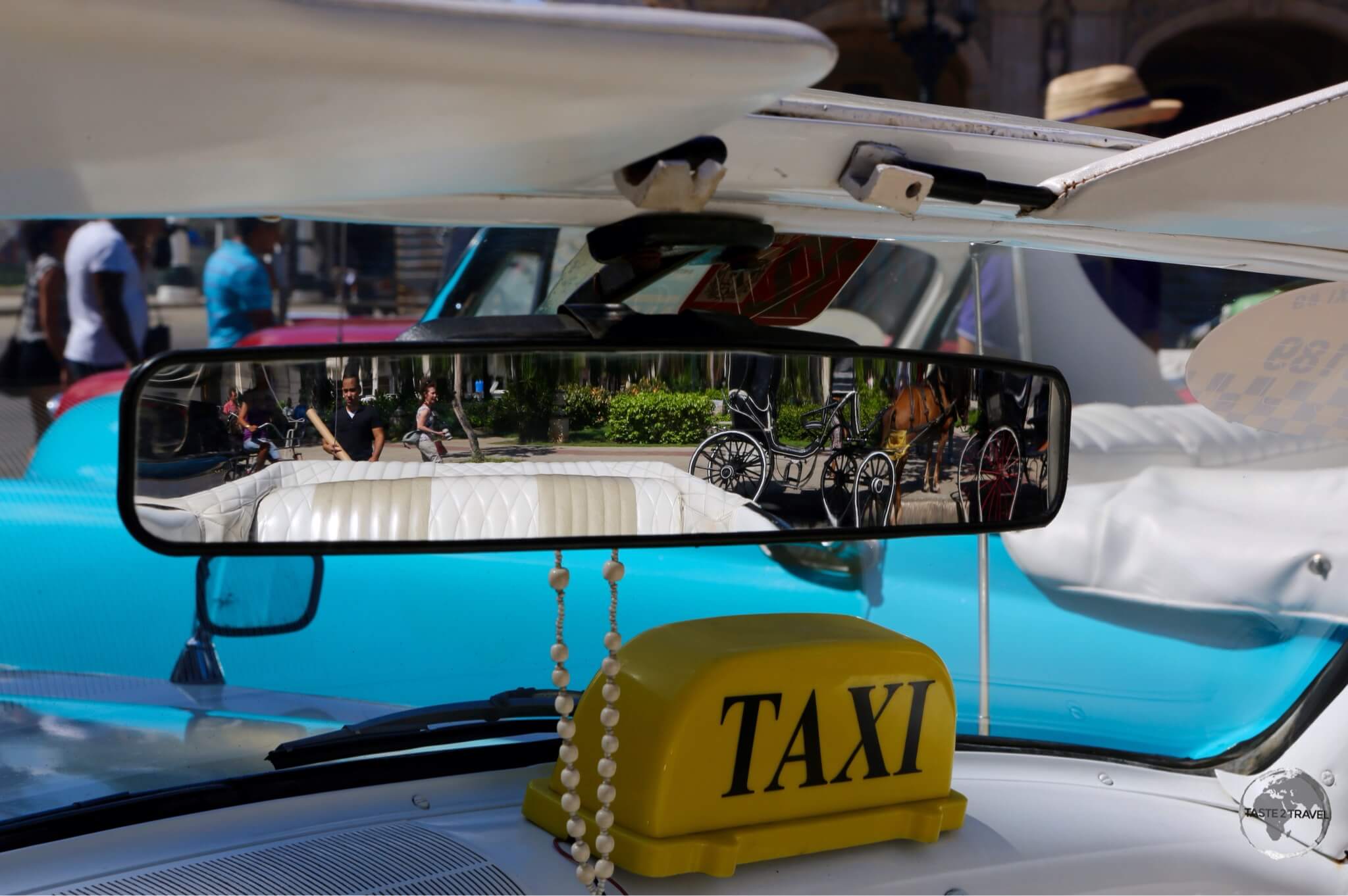 Interior view of an American classic car taxi in Havana old town.