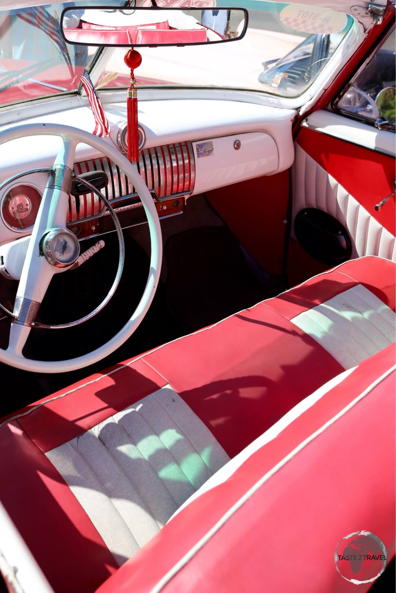 The interior of an American classic car in Havana old town.