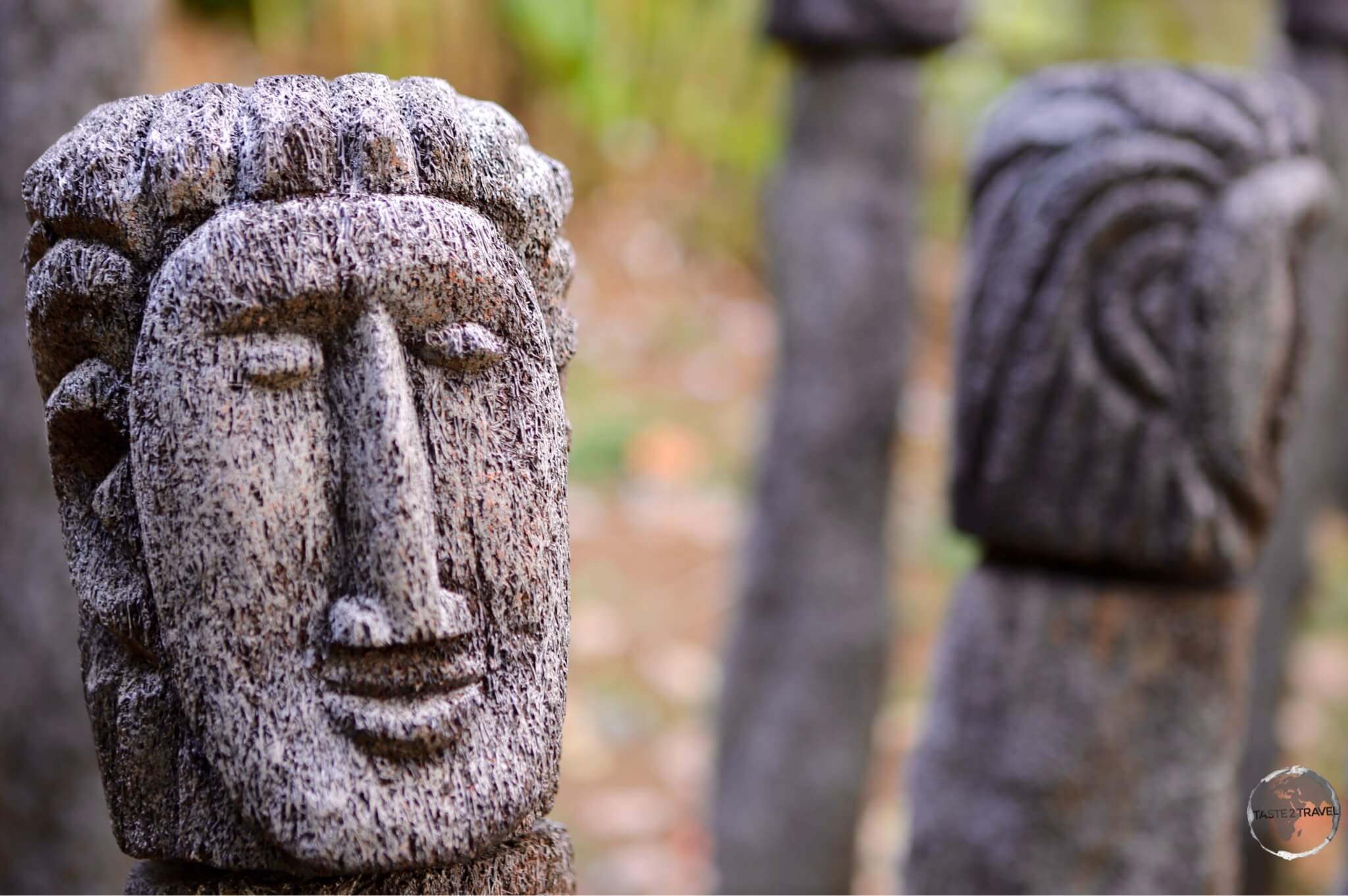 Traditional Kalinago busts carved from palm stumps.