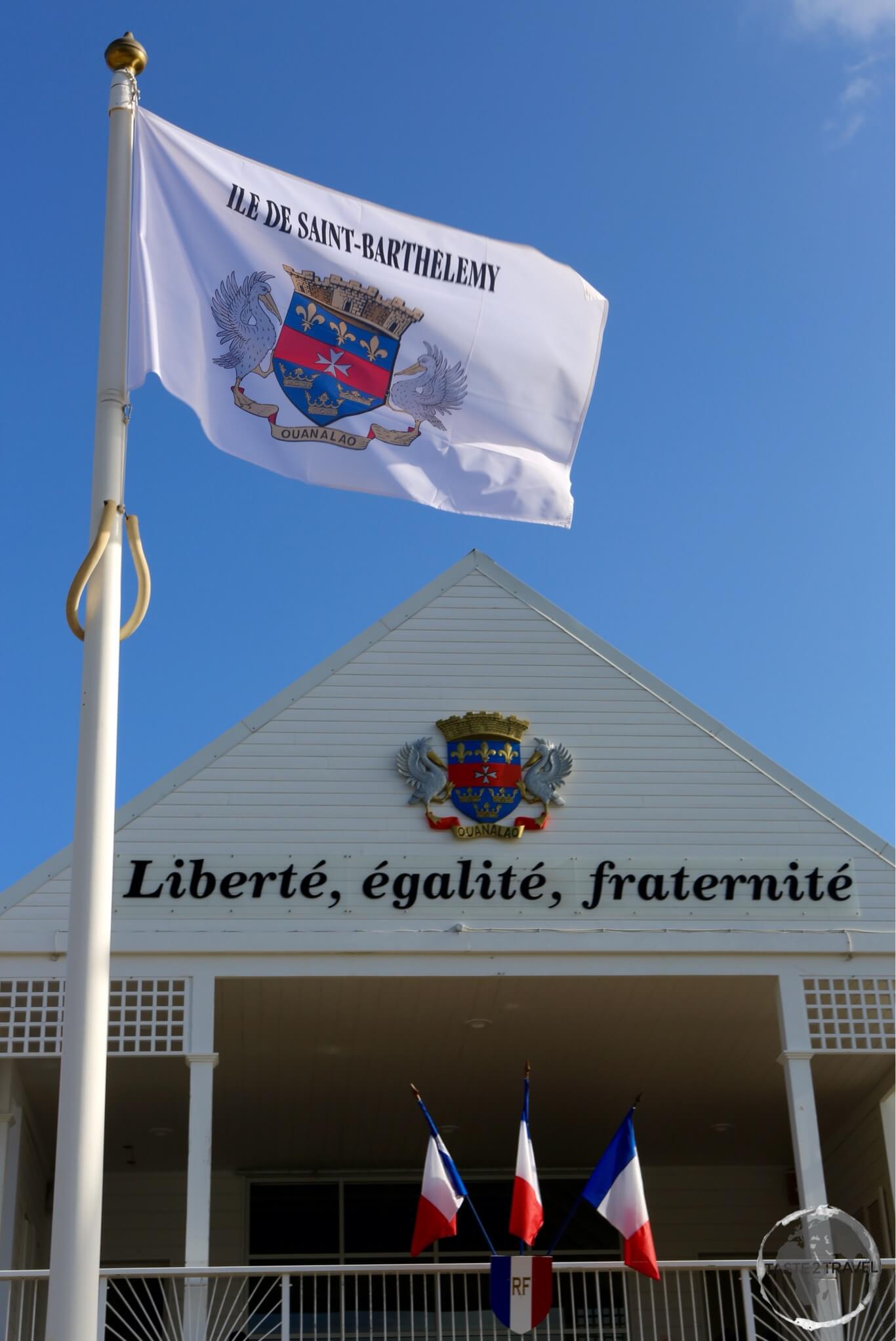 The flag of St. Barts flying outside the Hotel de Collectivite (City Hall) in Gustavia.