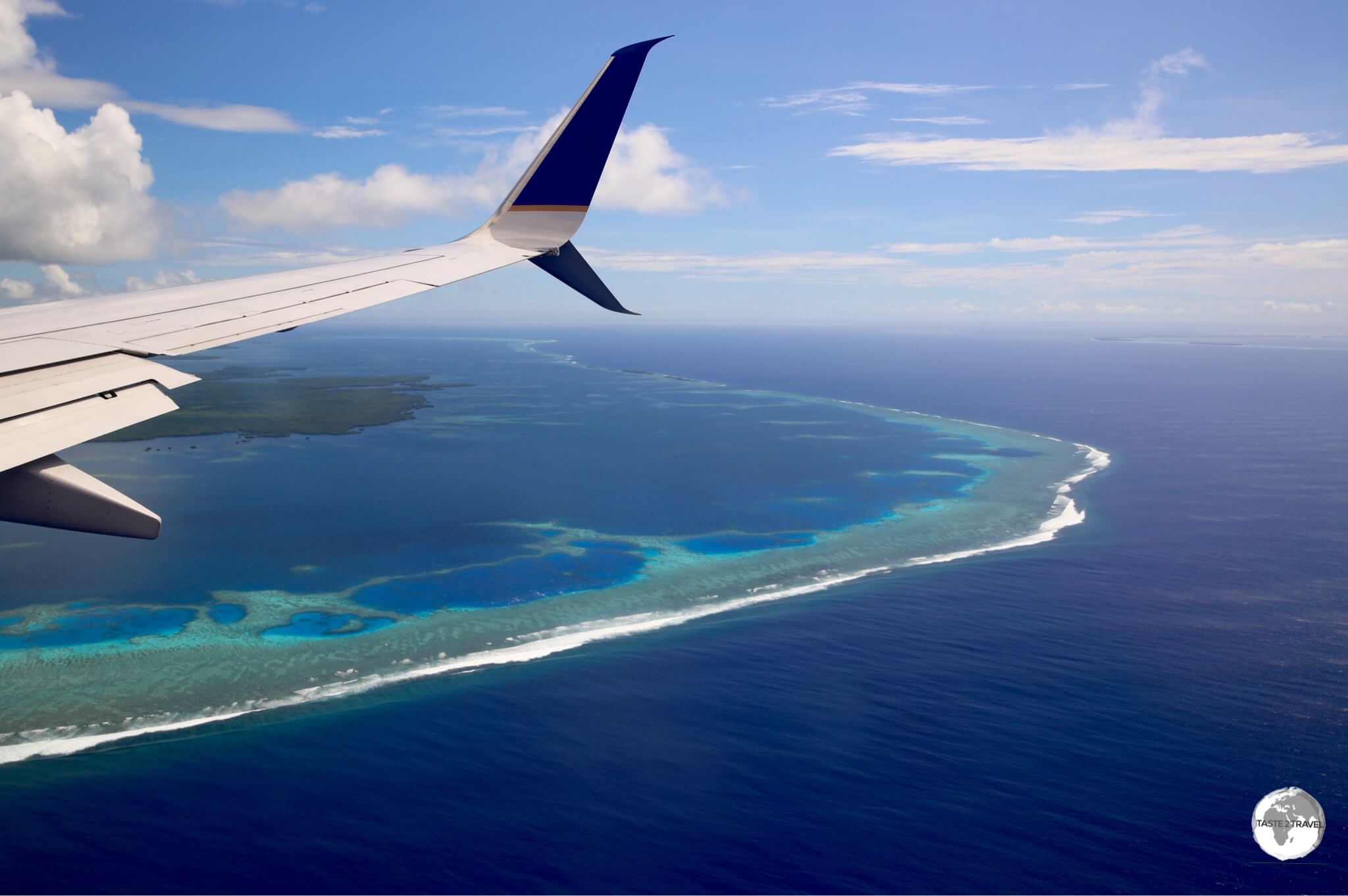 The view of the fringing reef which surrounds Pohnpei from my seat on United Airlines' Island Hopper. 