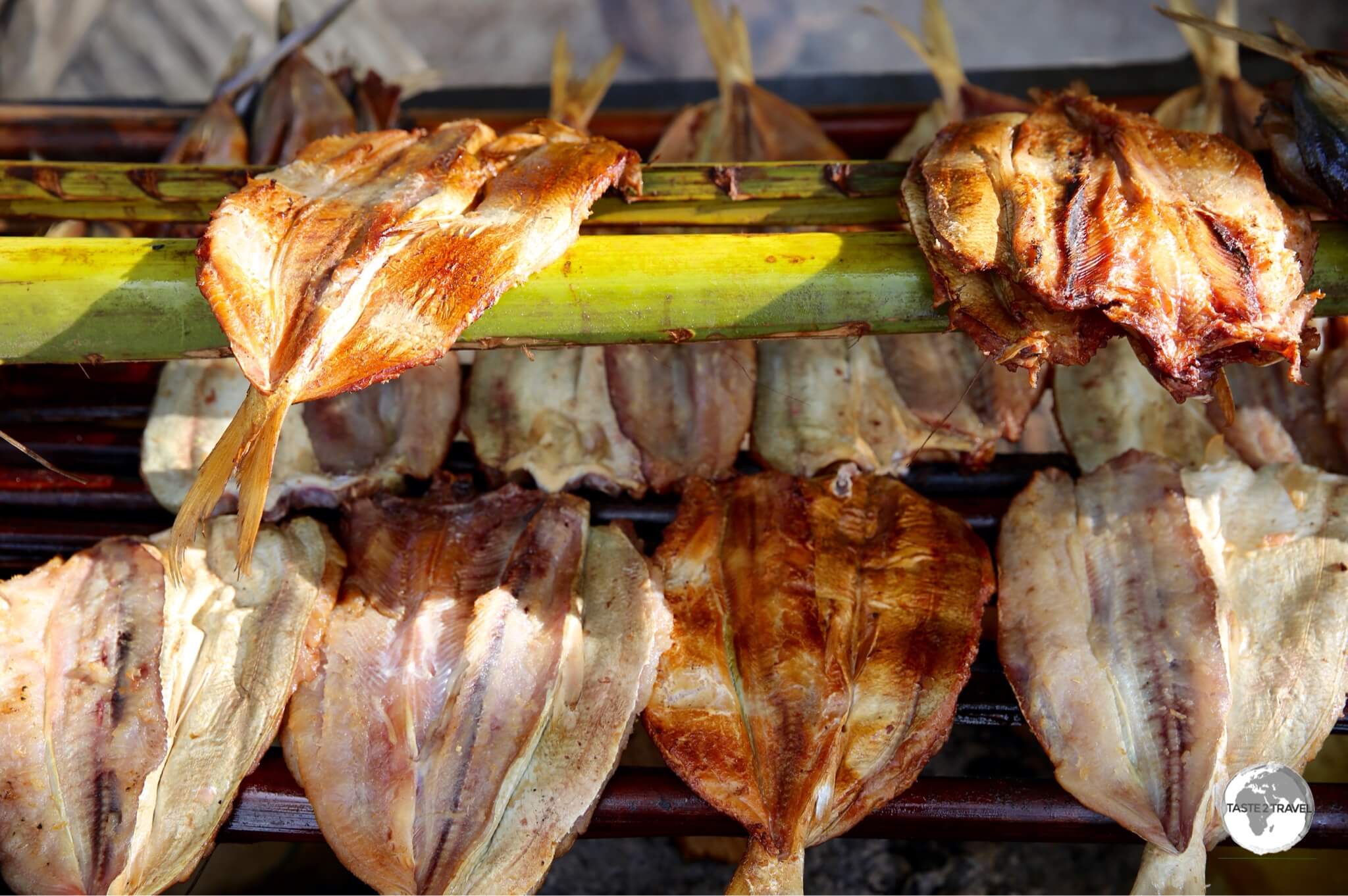 BBQ fish at a roadside fish market.