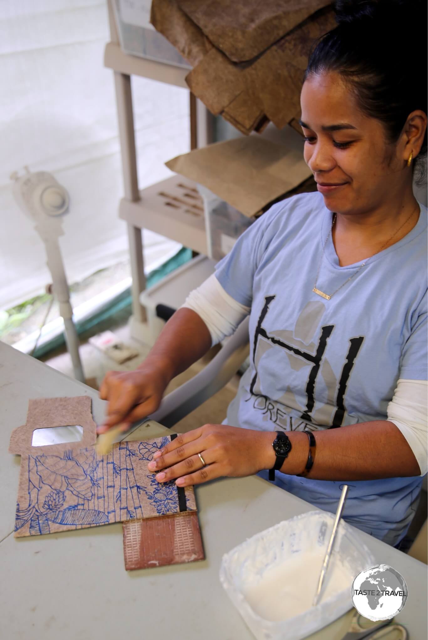 Step 5: Once dried, the company artisans transform the paper sheets into wallets, stationary, cards etc