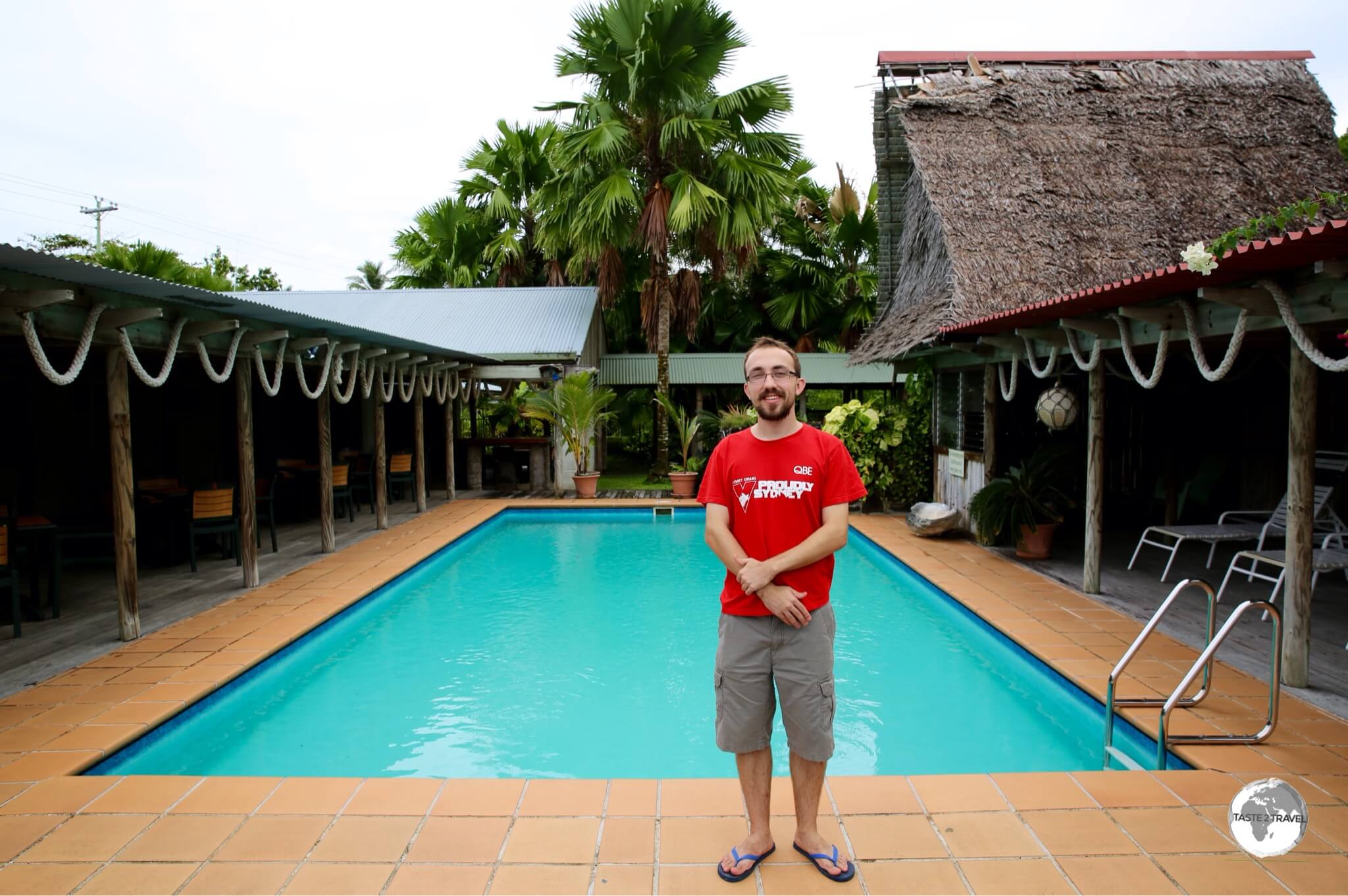 Joshua, by the pool at his 'raffle-ticket-winning' property - Kosrae Nautilus Resort.