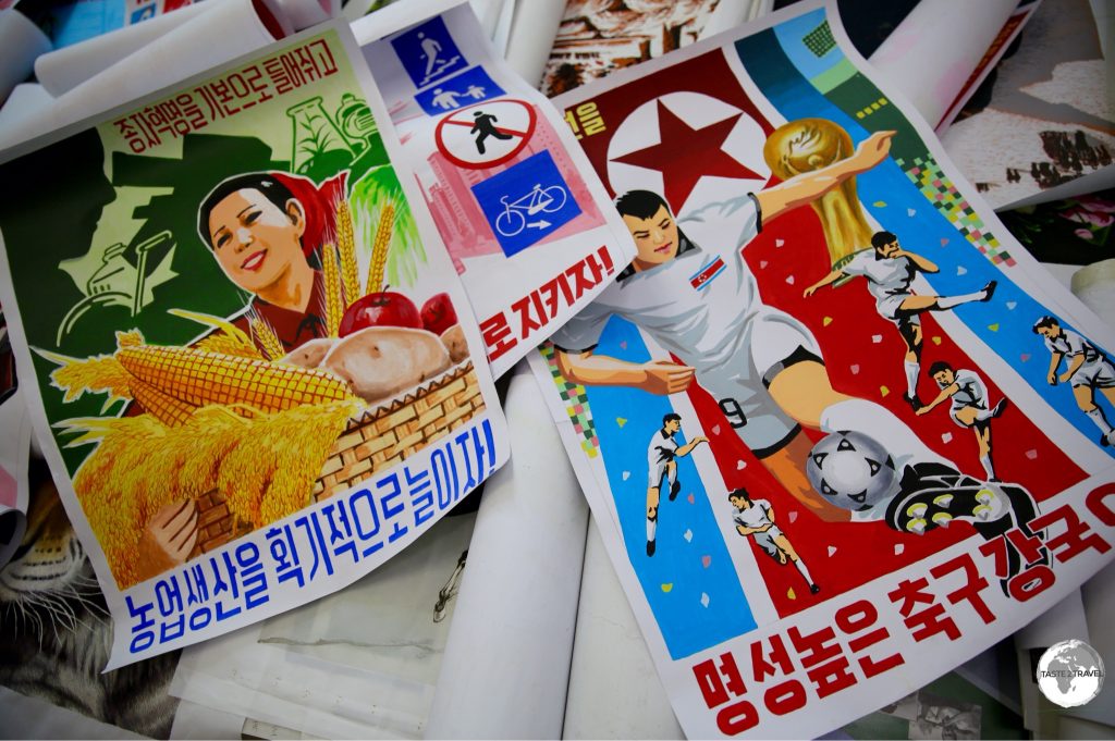 Hand-painted propaganda posters at the Foreign Language Bookshop in Pyongyang.