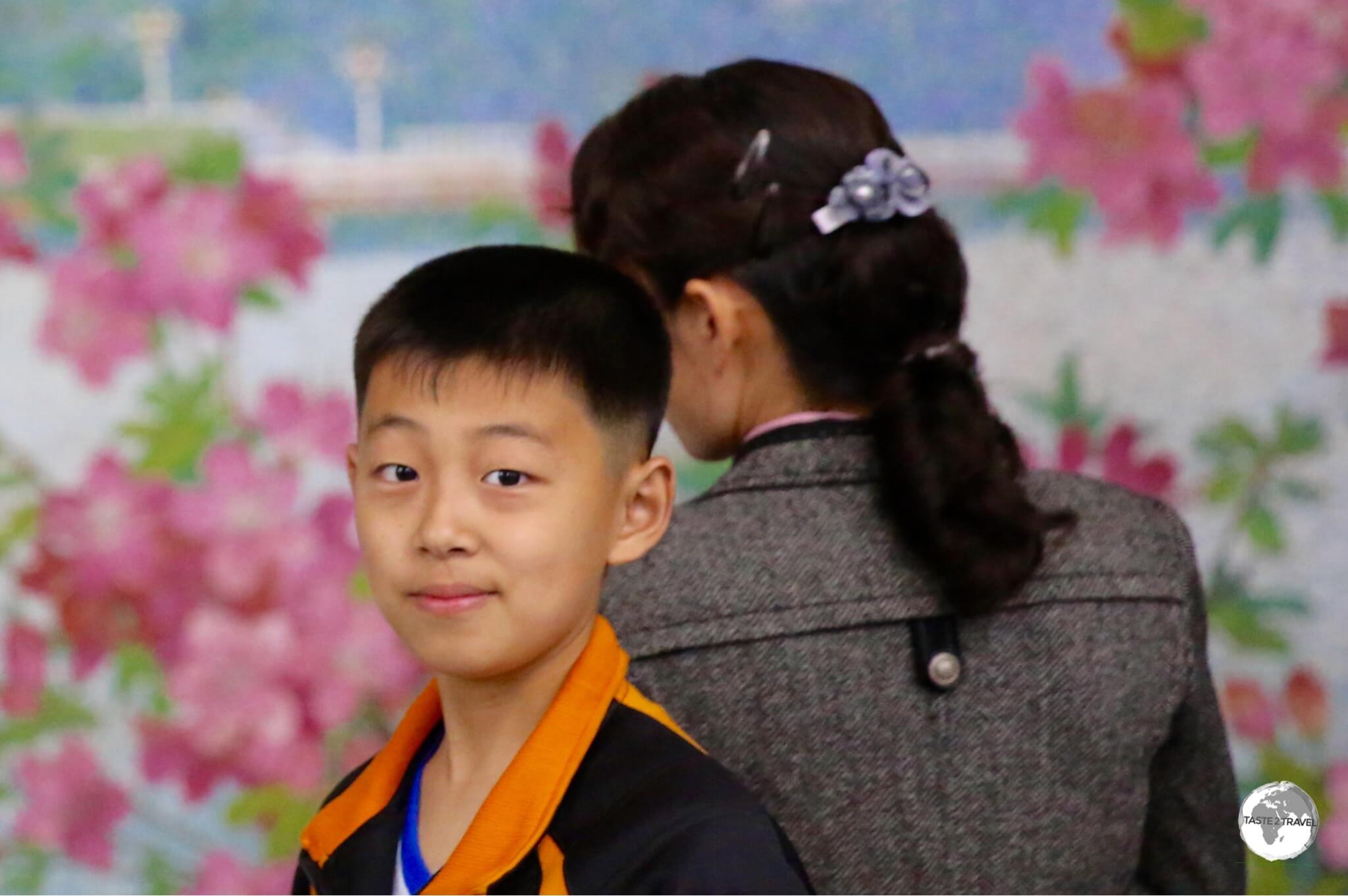 A boy waiting for his train at Yonggwang metro station.