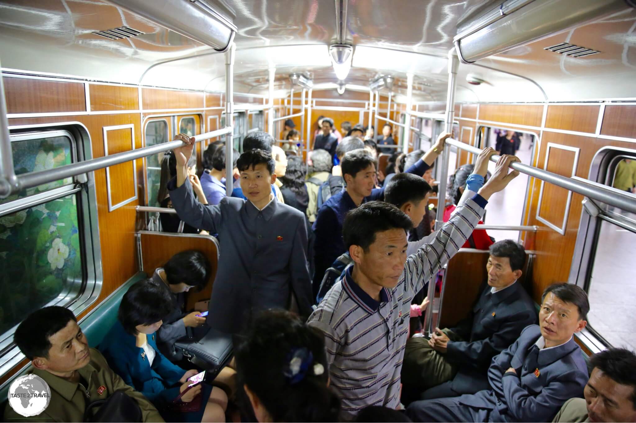 Riding the Pyongyang metro during the morning rush hour, in a carriage full North Korean commuters, who were polite, curious and always keen to offer their seats.