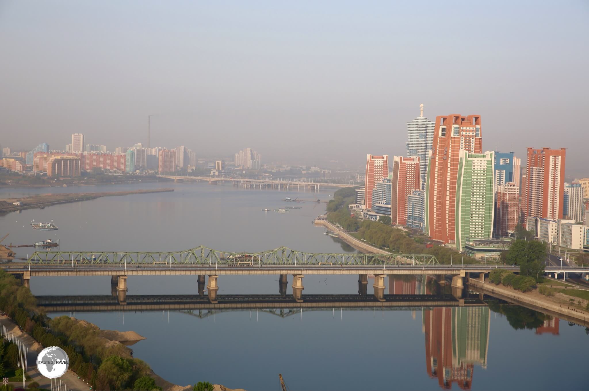 The morning view of the Taedong river and Mirae Future Scientist street from the Yanggakdo International Hotel in Pyongyang.