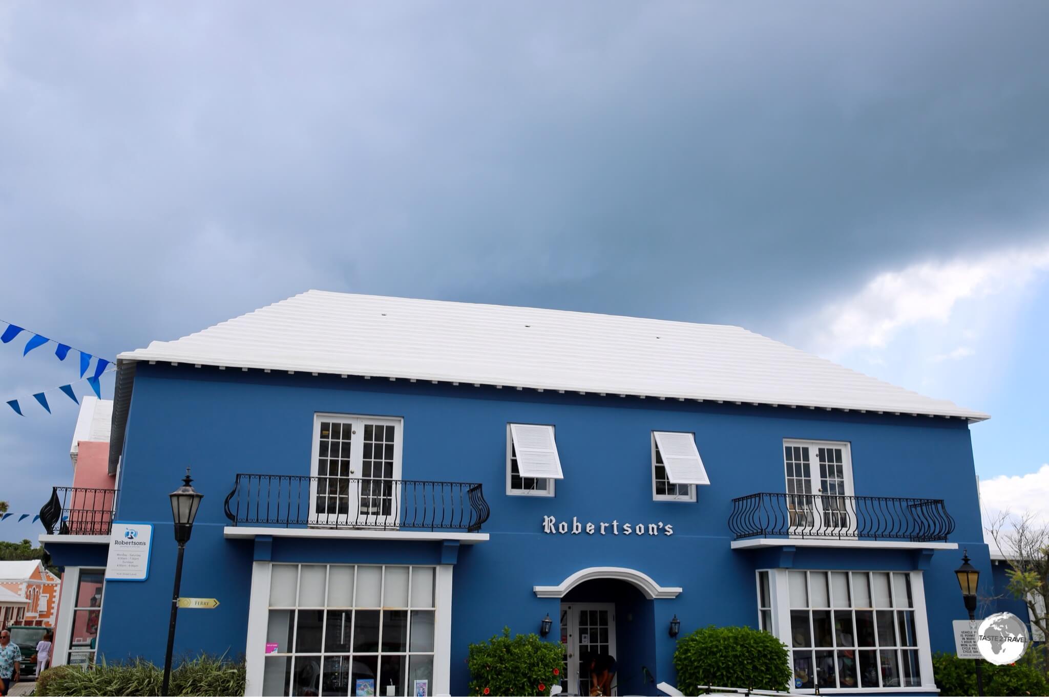 The streets of historic St. Georges are lined with beautifully renovated stone buildings all of which are topped with white limestone-slab roofs. 