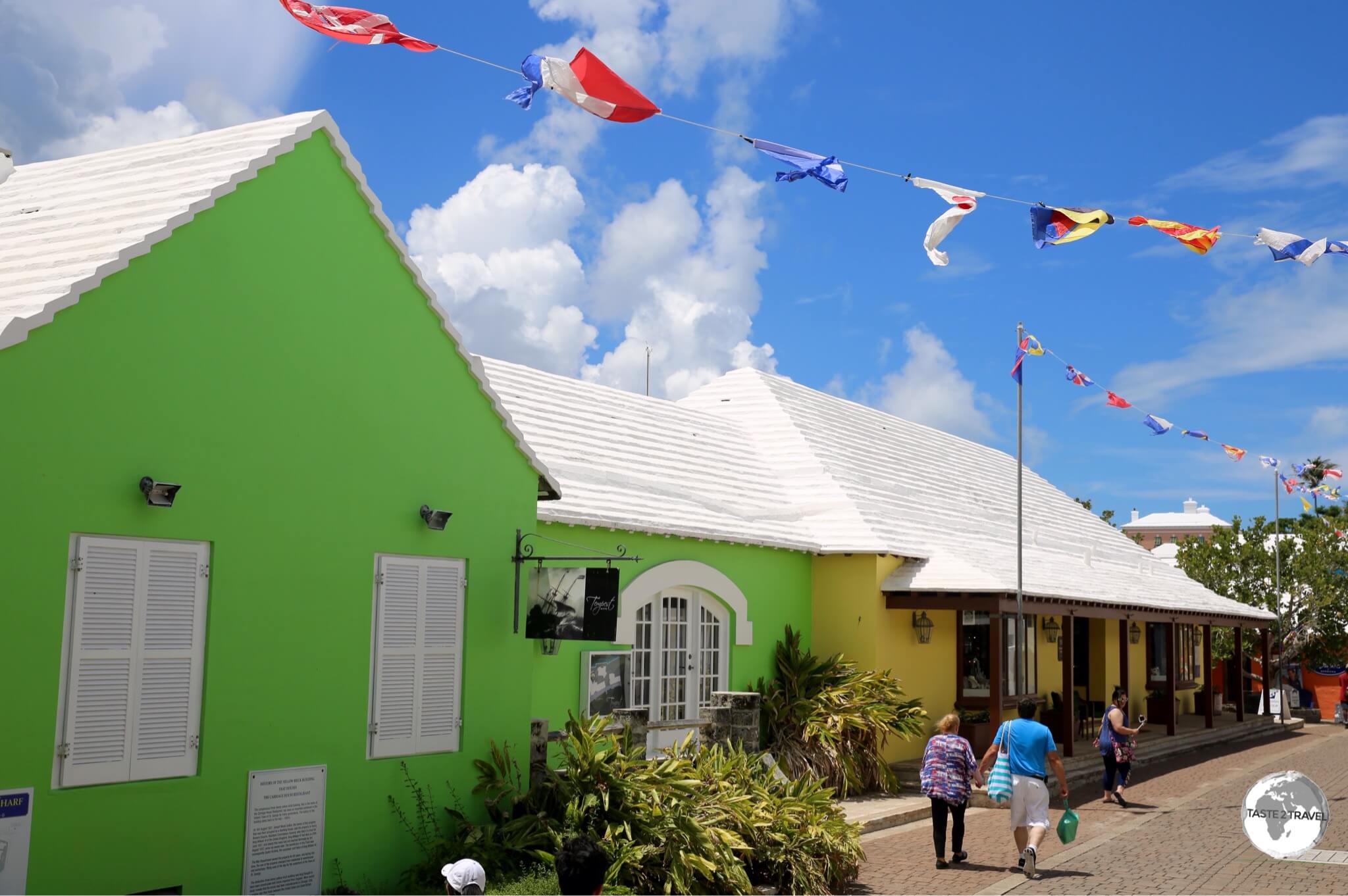 Shops in St. Georges town with their white 'rainwater catchment' limestone rooftops.