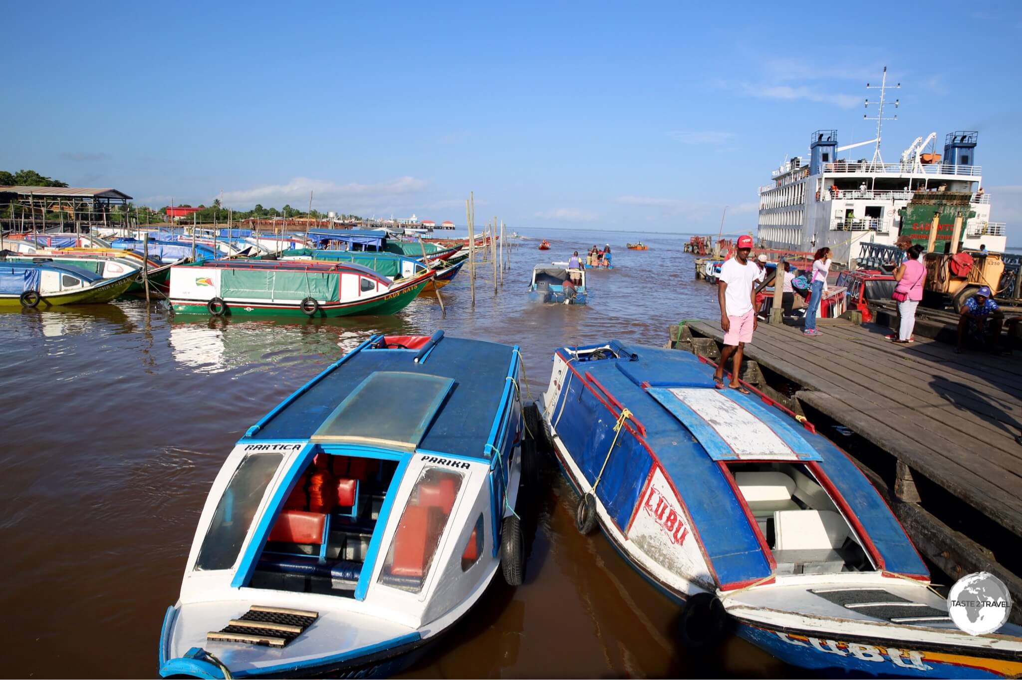 Essequibo Region Guyana Travel Guide: Passenger speedboats at Parika port.