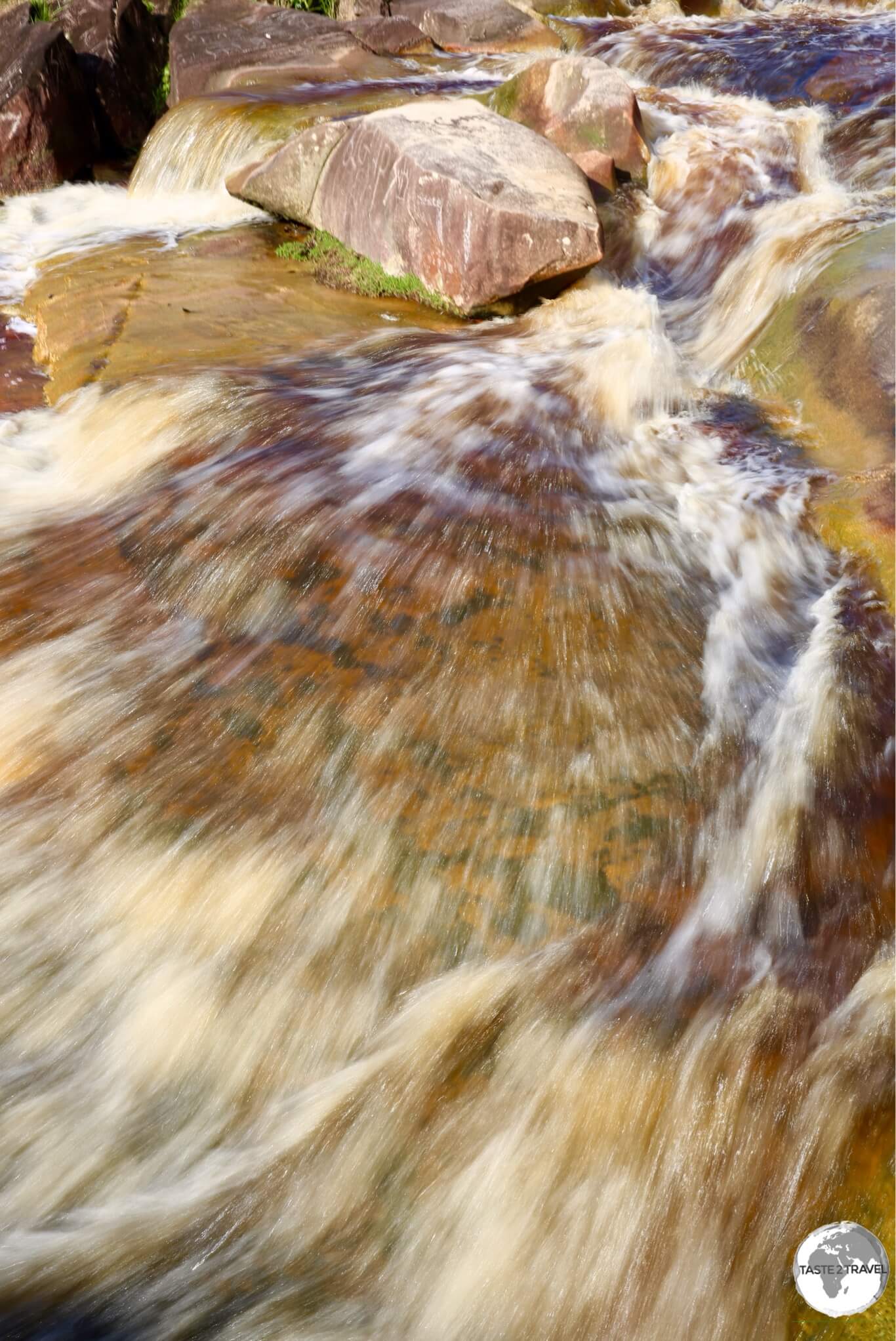 Swimming at the BK waterfall outside of Bartica.