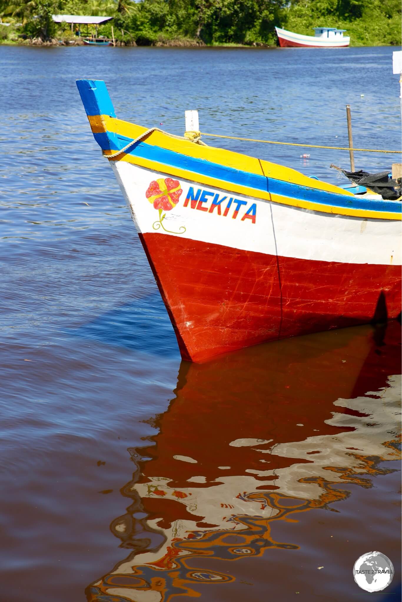 Boat on the Pomeroon river at Charity.