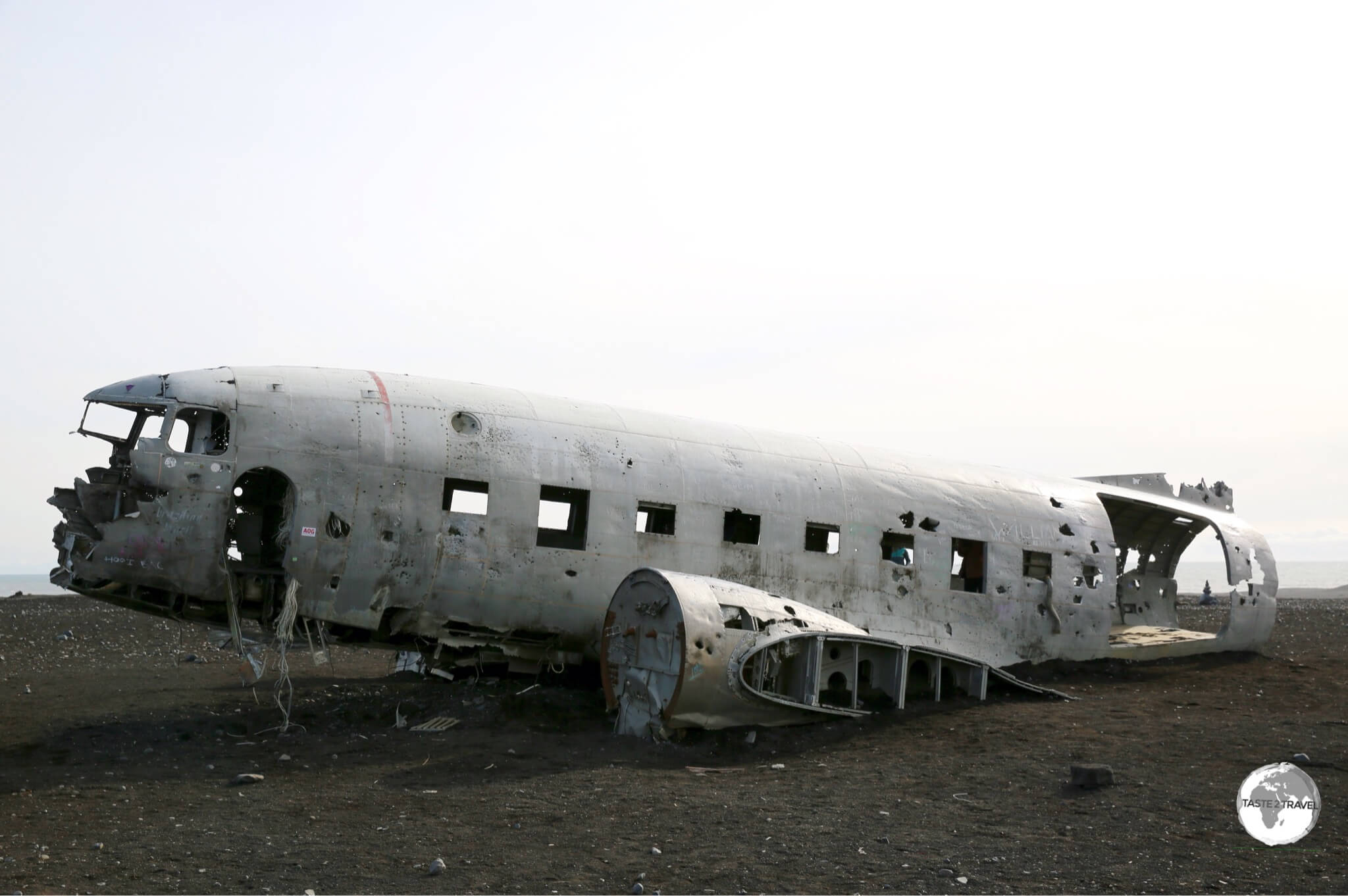 A US Navy airplane, a Douglas Super DC-3, wrecked on the black sands of Sólheimasandur beach.