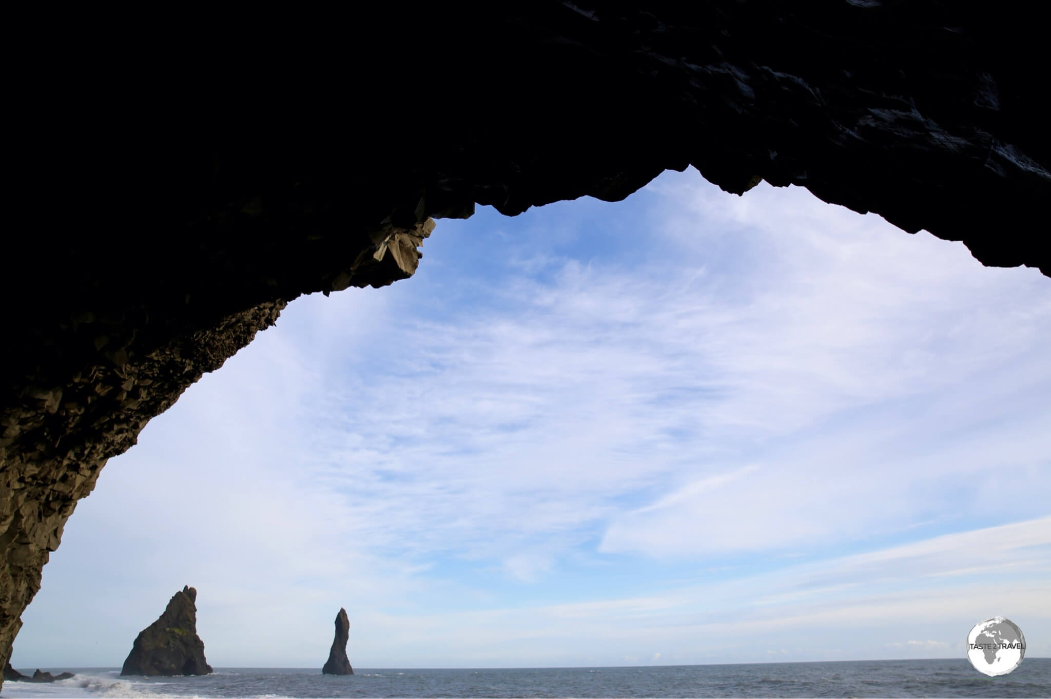 View of Reynisdrangar from inside the basalt column cave.