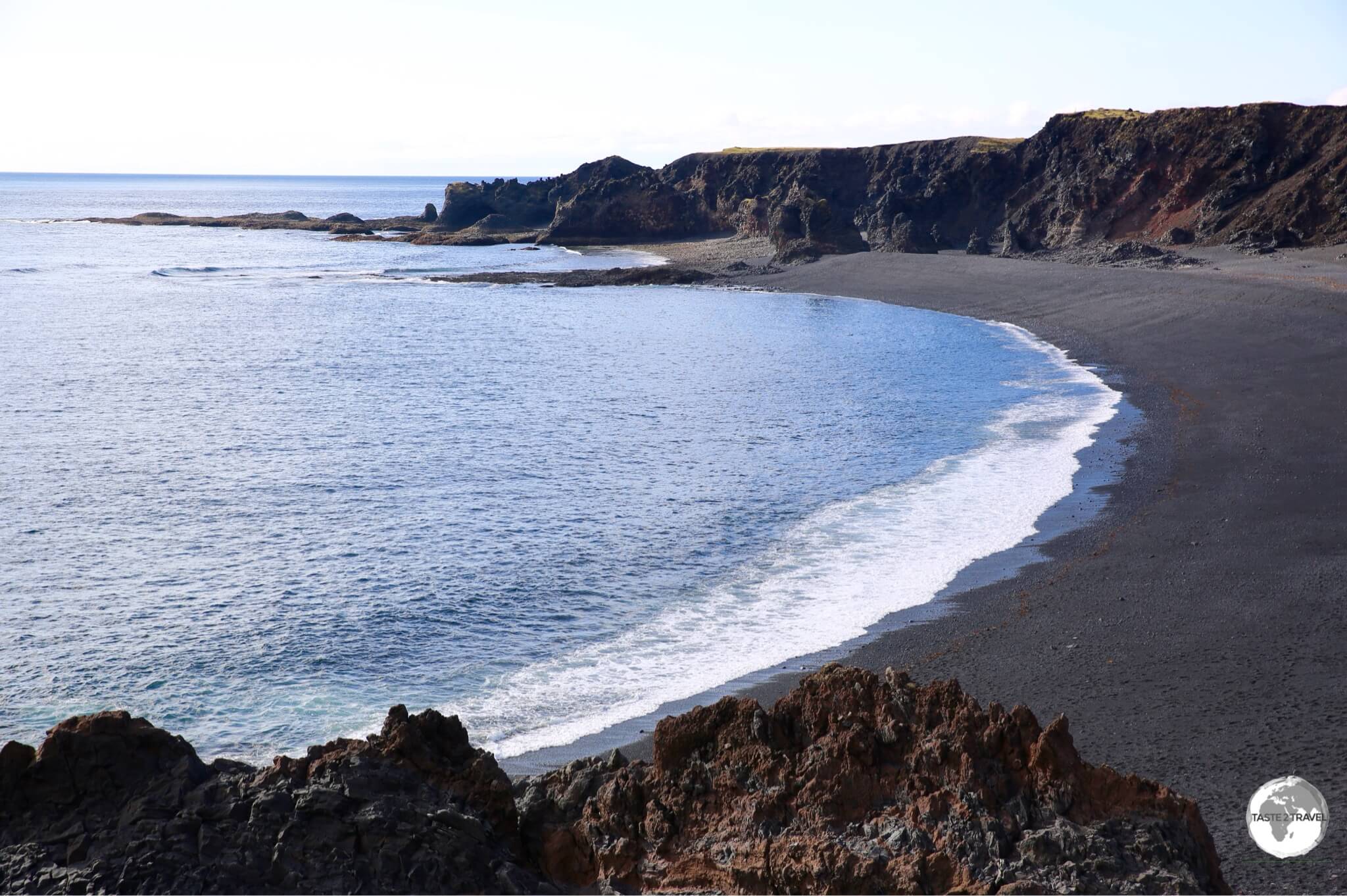 Djúpalónssandur beach is surrounded by lava formations.