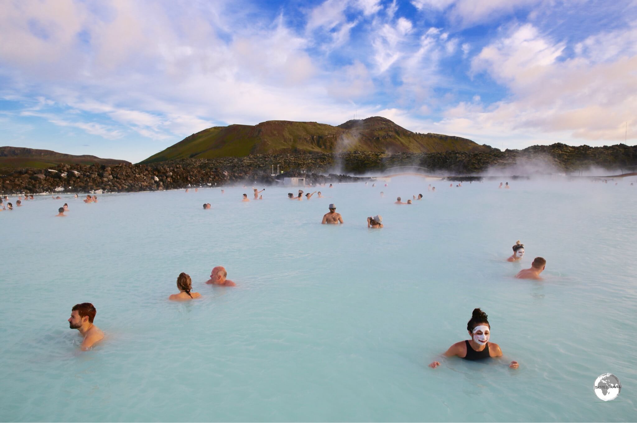 Bathers enjoying the warm, soothing waters of the Blue Lagoon.