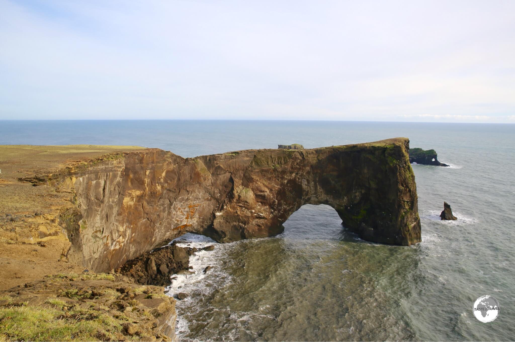 Dyrhólaey - a 120 m high arch carved out of a promontory. 