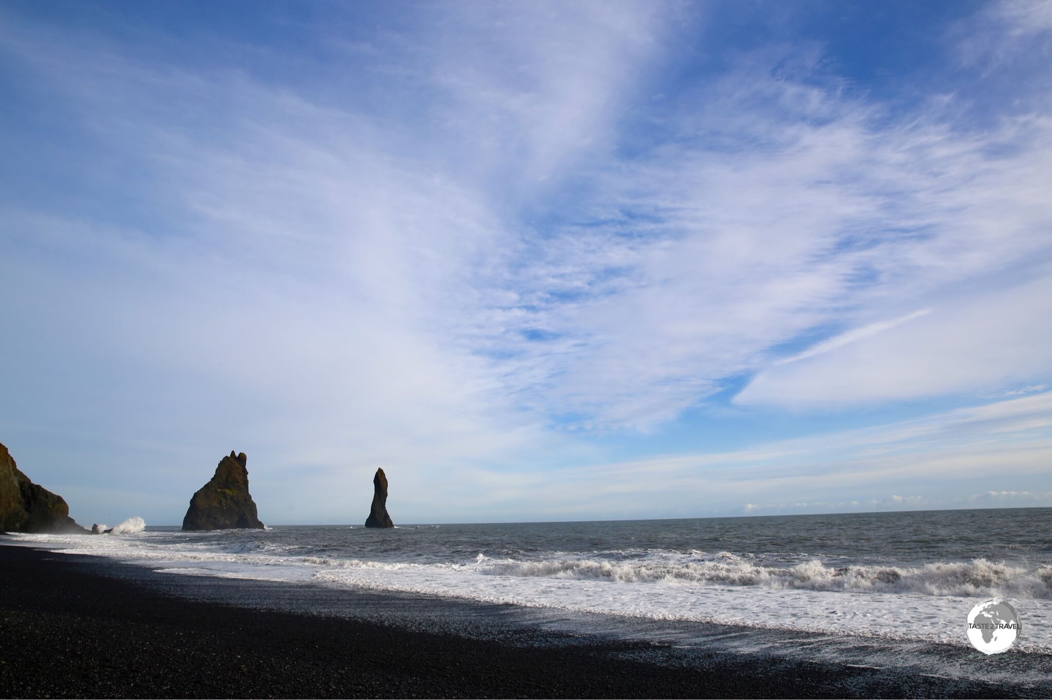 Reynisfjara (black-sand beach) with the towering Reynisdrangar