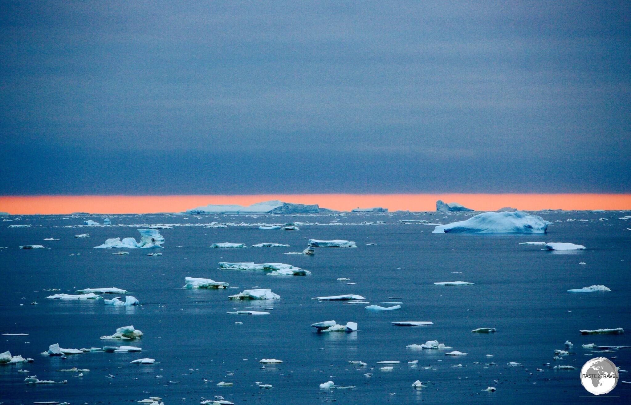 A 'sunset' view at 11 pm, near the Antarctic Circle, north of Adelaide Island.