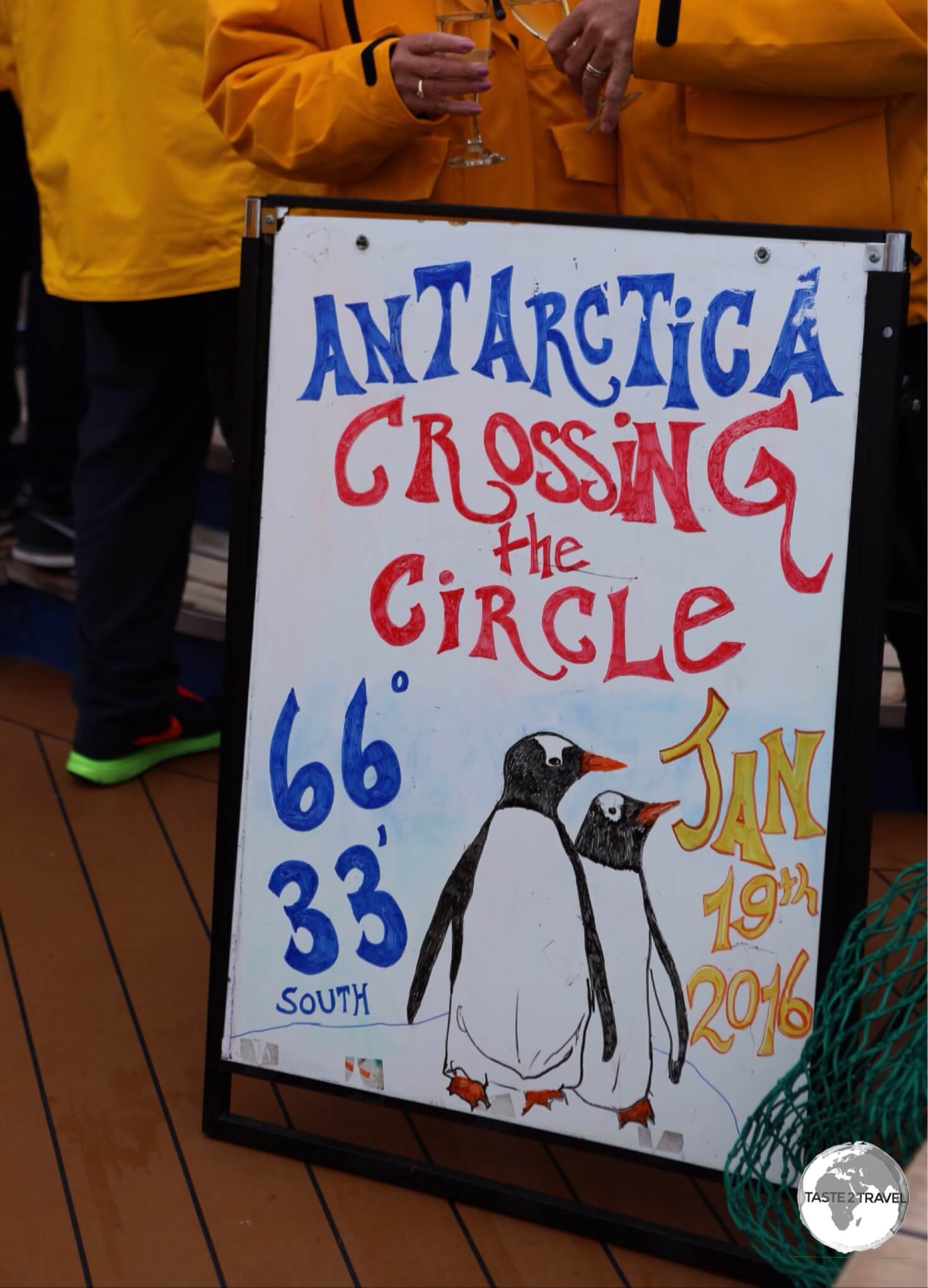 A cause for celebration as few travellers get to cross the Antarctic circle.