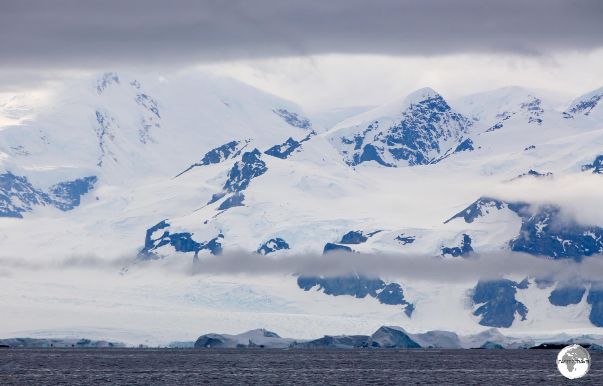 The towering, majestic peaks of Graham Land line the shore of Crystal Sound.