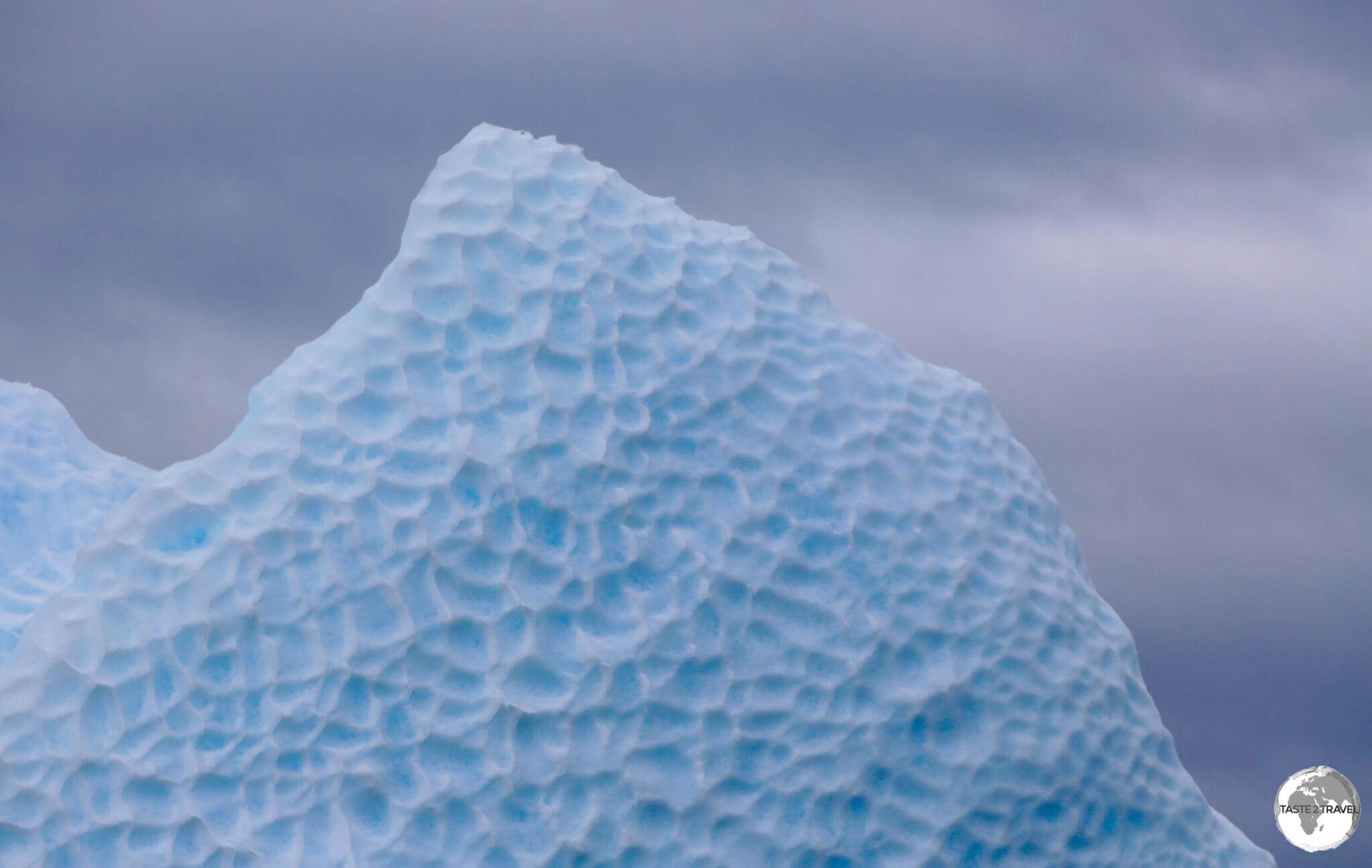 The dimpled, exposed underside of a turned iceberg in Crystal Sound.