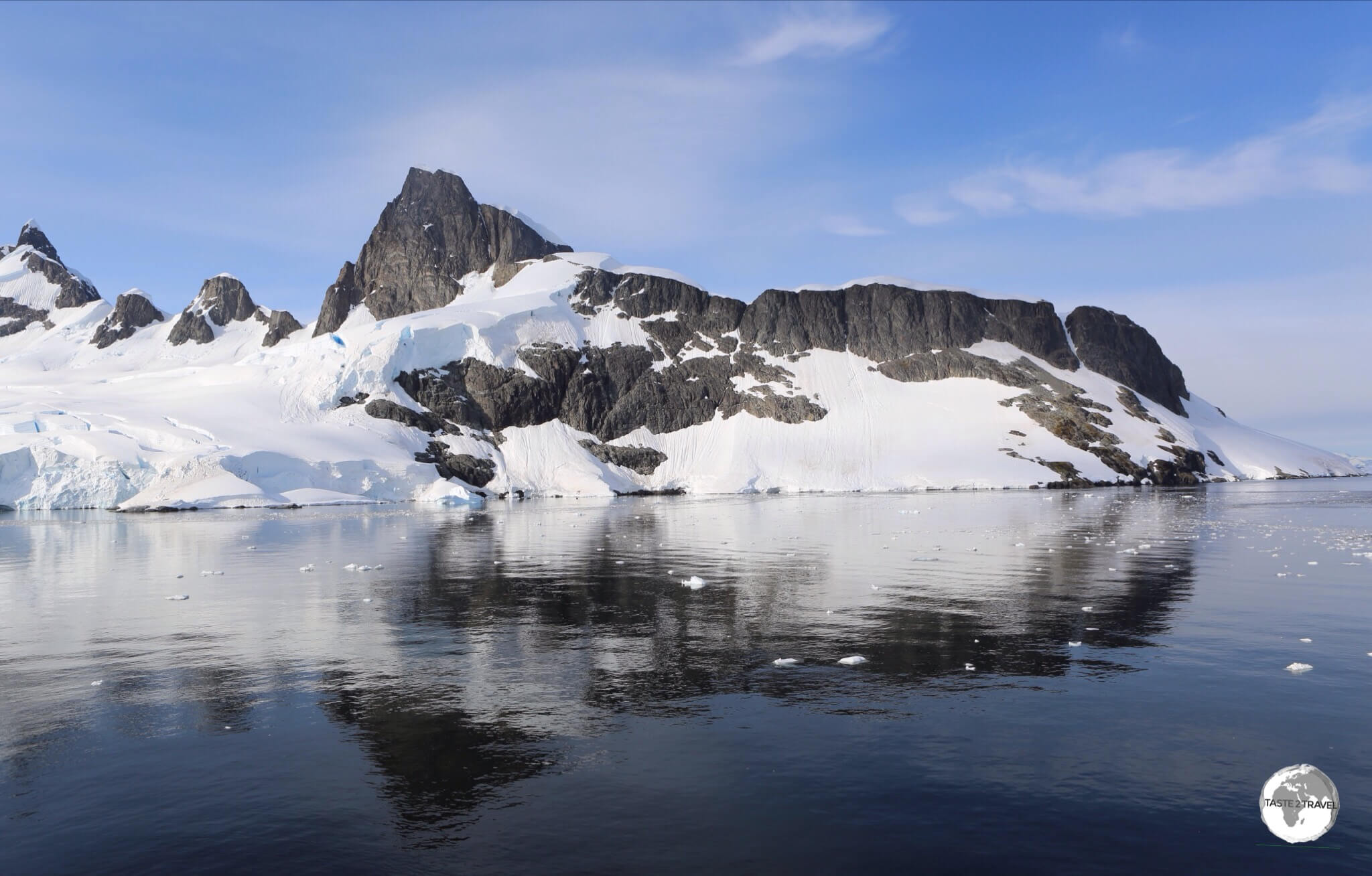 A view of the mountainous Antarctic peninsula from the Graham passage.