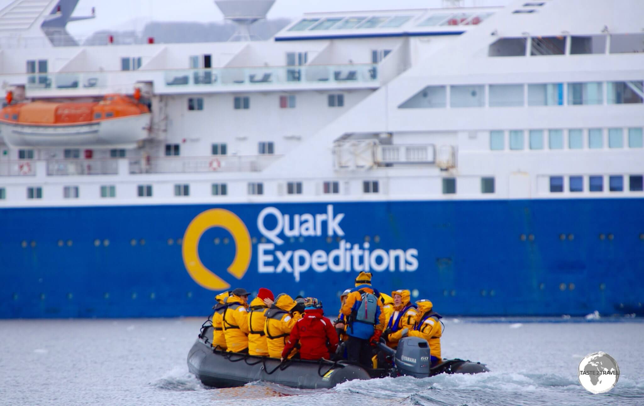 Returning to Quark Expeditions' <i>Ocean Diamond</i> after a Zodiac sea excursion on Crystal Sound.