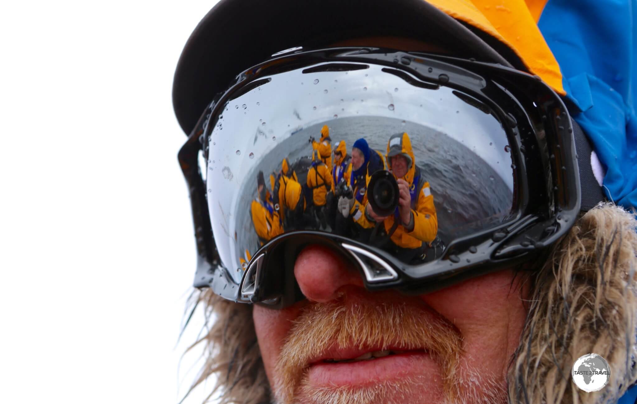 Cruising the Neumayer channel at Damoy point with our Zodiac pilot who was also one of the Expedition crew specialists. 