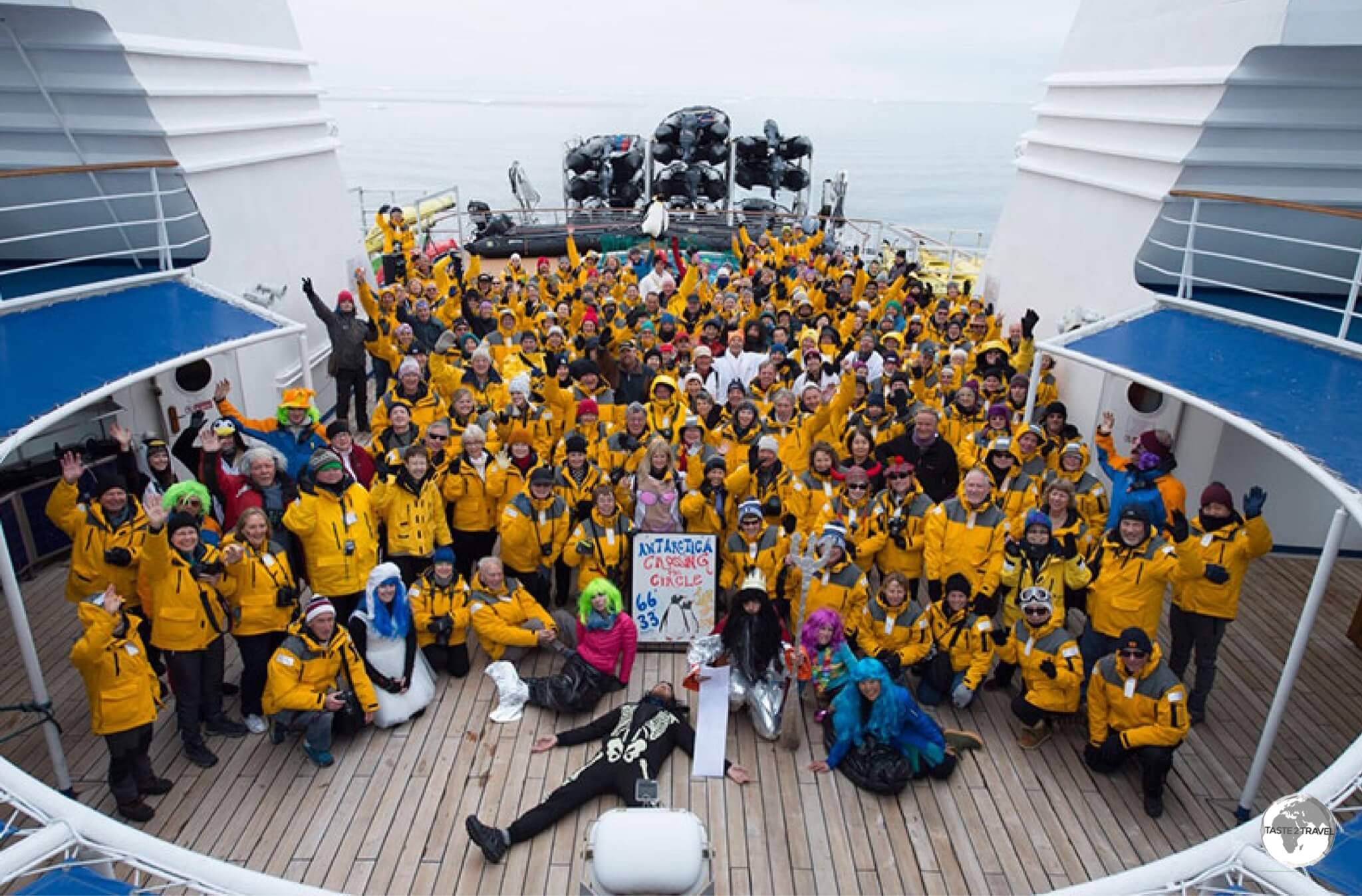 A group photo, taken at the Antarctic Circle, one of the major goals on our <i>Crossing the Circle</i> expedition.