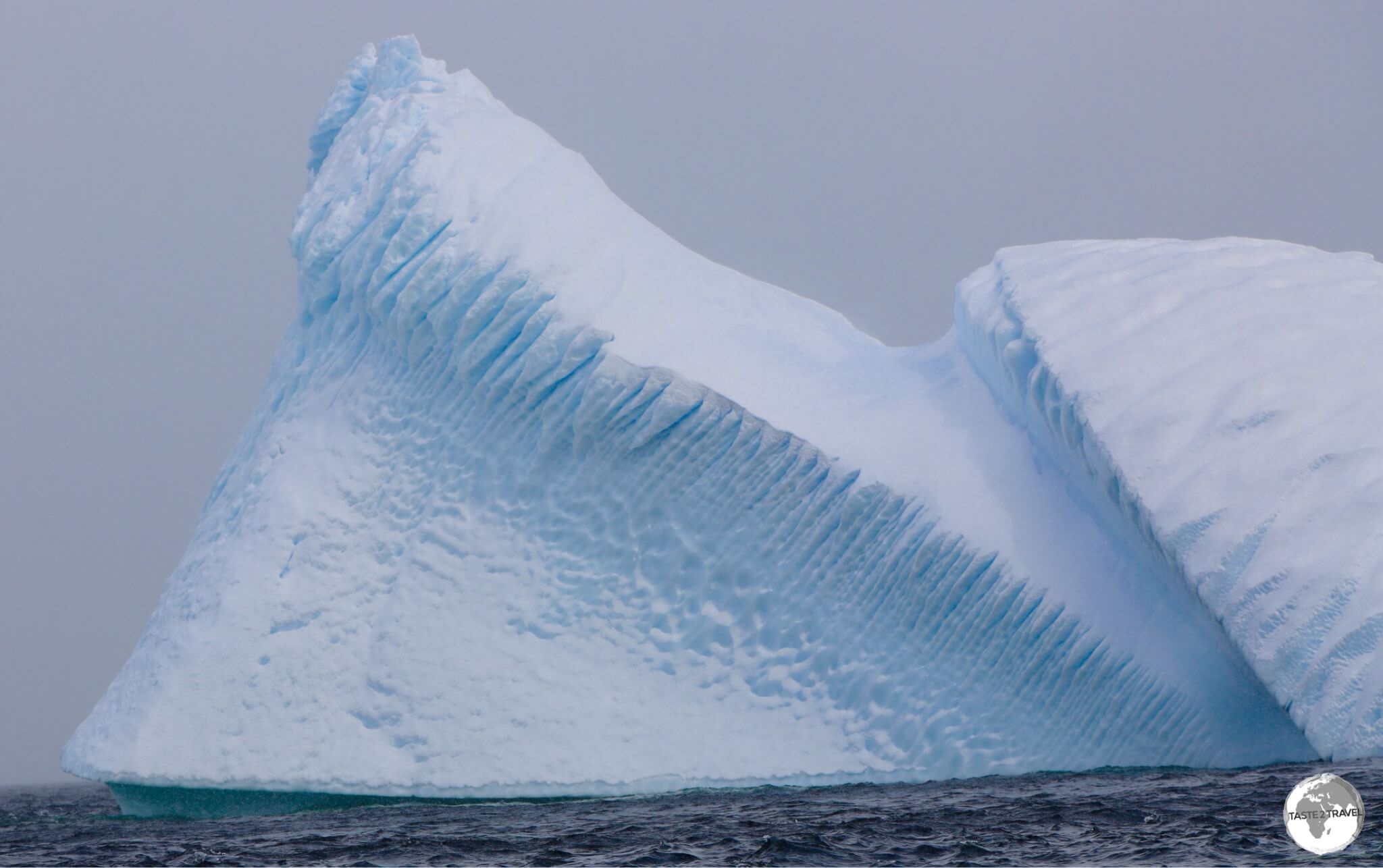 A wind-sculptured Iceberg, sitting in the Neumayer channel at Damoy point.