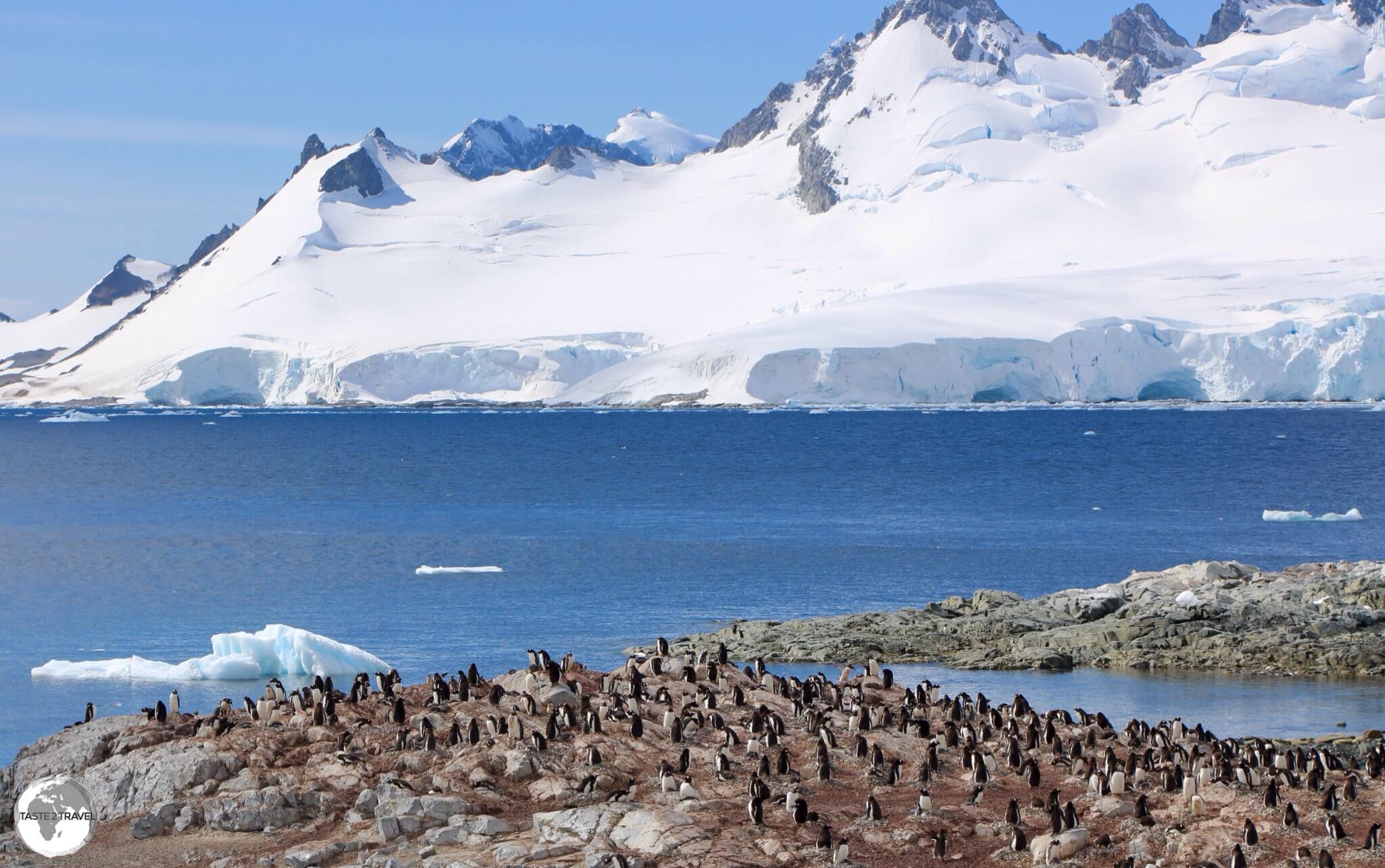 A view of the Errera channel, Graham Land and a large Gentoo penguin colony from Danco Island. A view of the Errera channel, Graham Land and a large Gentoo penguin colony from Danco Island. 