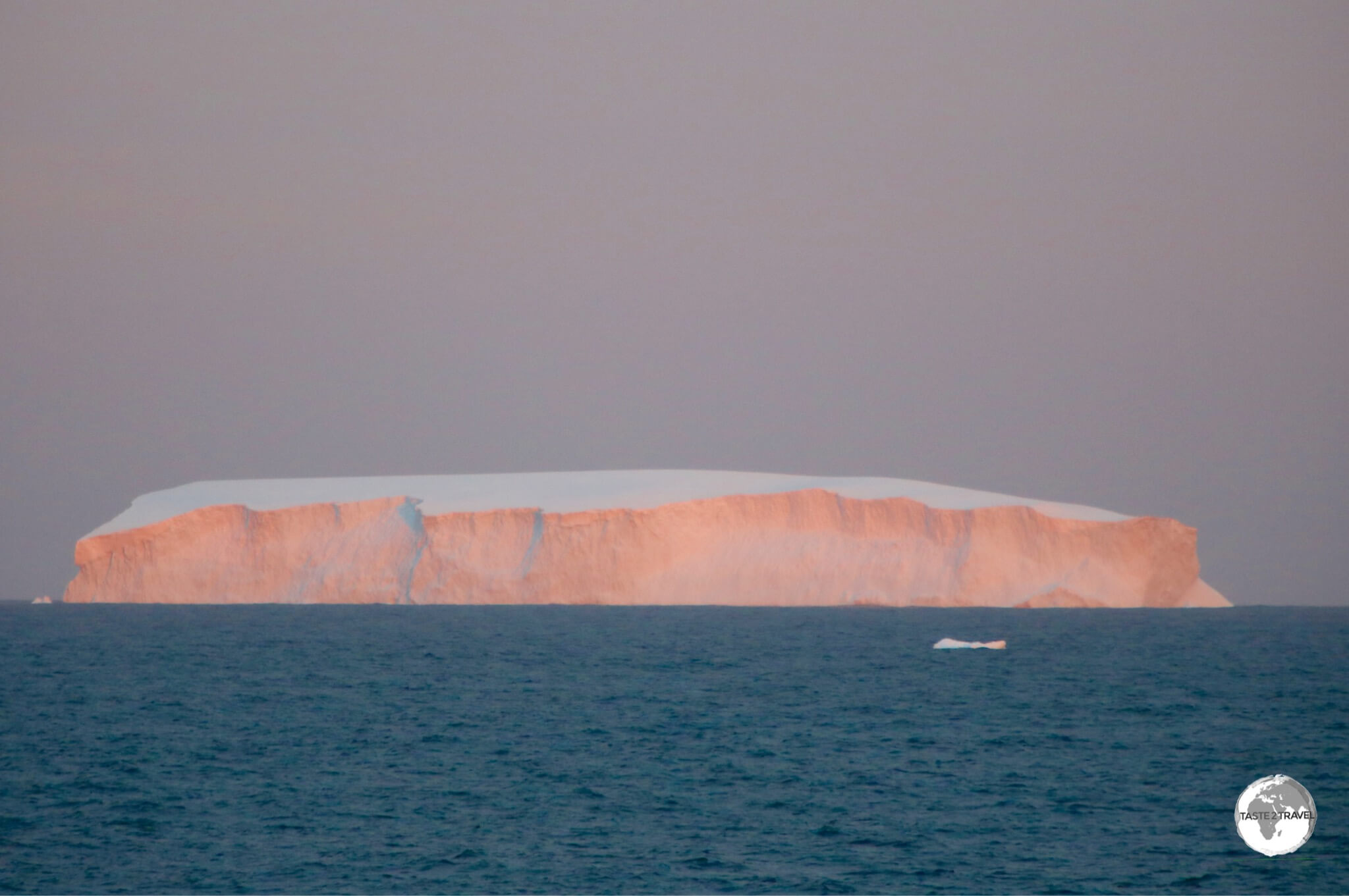 An iceberg glows in the setting sunlight as we commence the long journey from the Antarctic peninsula, across the Drake passage, back to Ushuaia.