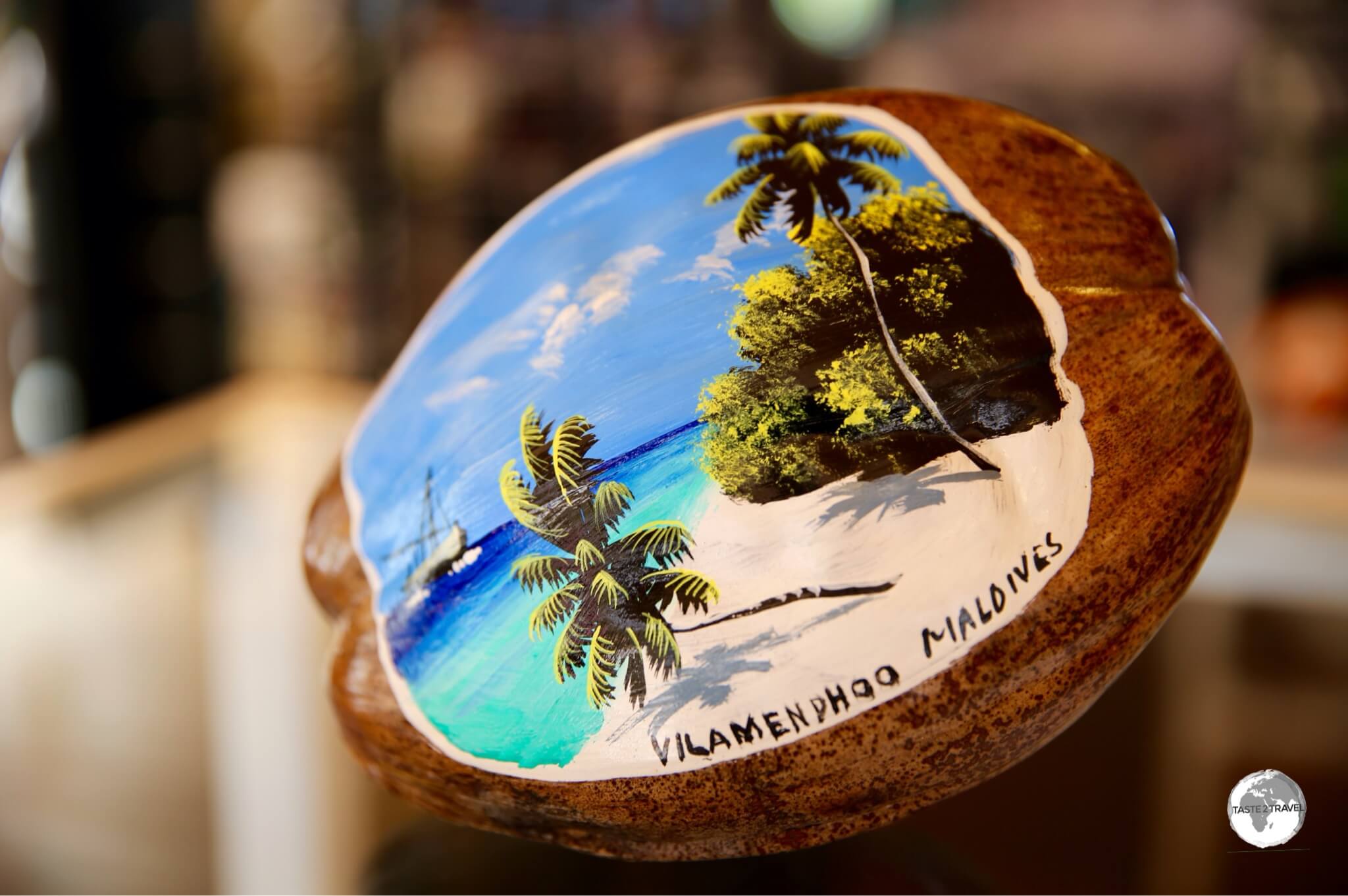 A painted coconut souvenir from Vilamendhoo Island Resort and Spa.