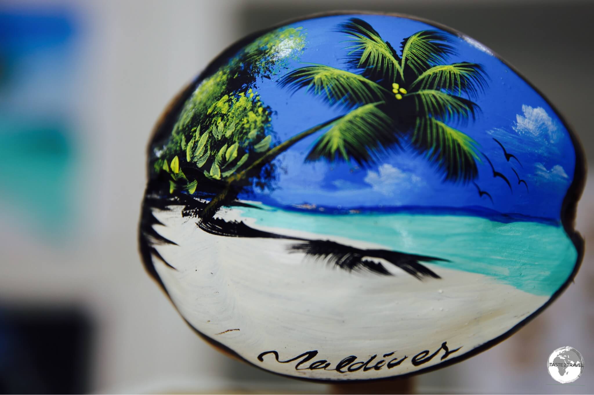 Painted coconut souvenir from the art studio of Ibrahim Shinaz of Maafushi Island. 