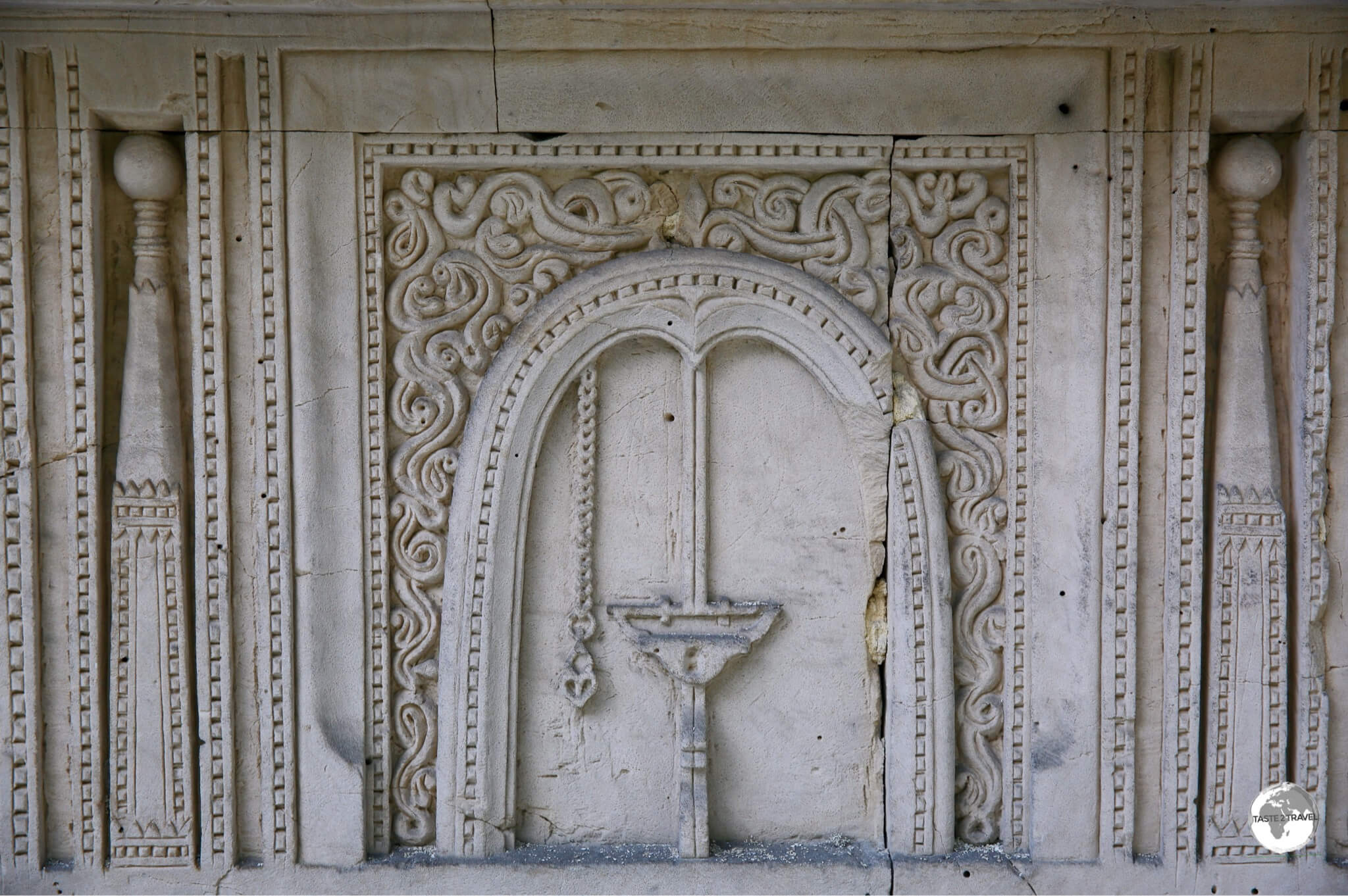 Intricate coral stonework panel at the Friday Mosque in Malé.