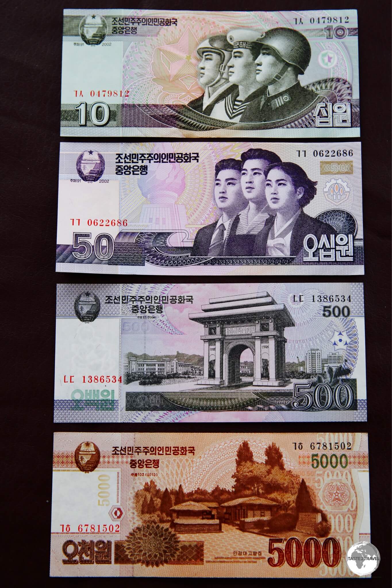 The front view of my North Korea Won bank notes, which I purchased from the currency exchange counter at Kwanbok department store in Pyongyang. 