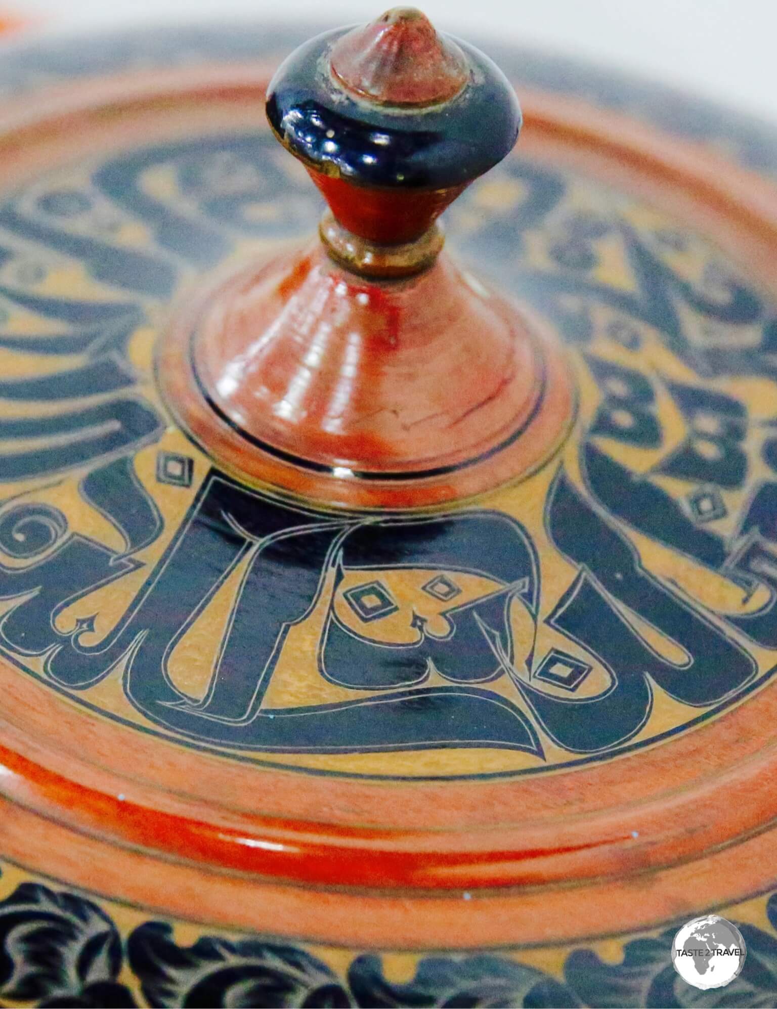 Old Malaafaiy lacquered wooden food cover, one of the displays at the National Museum.