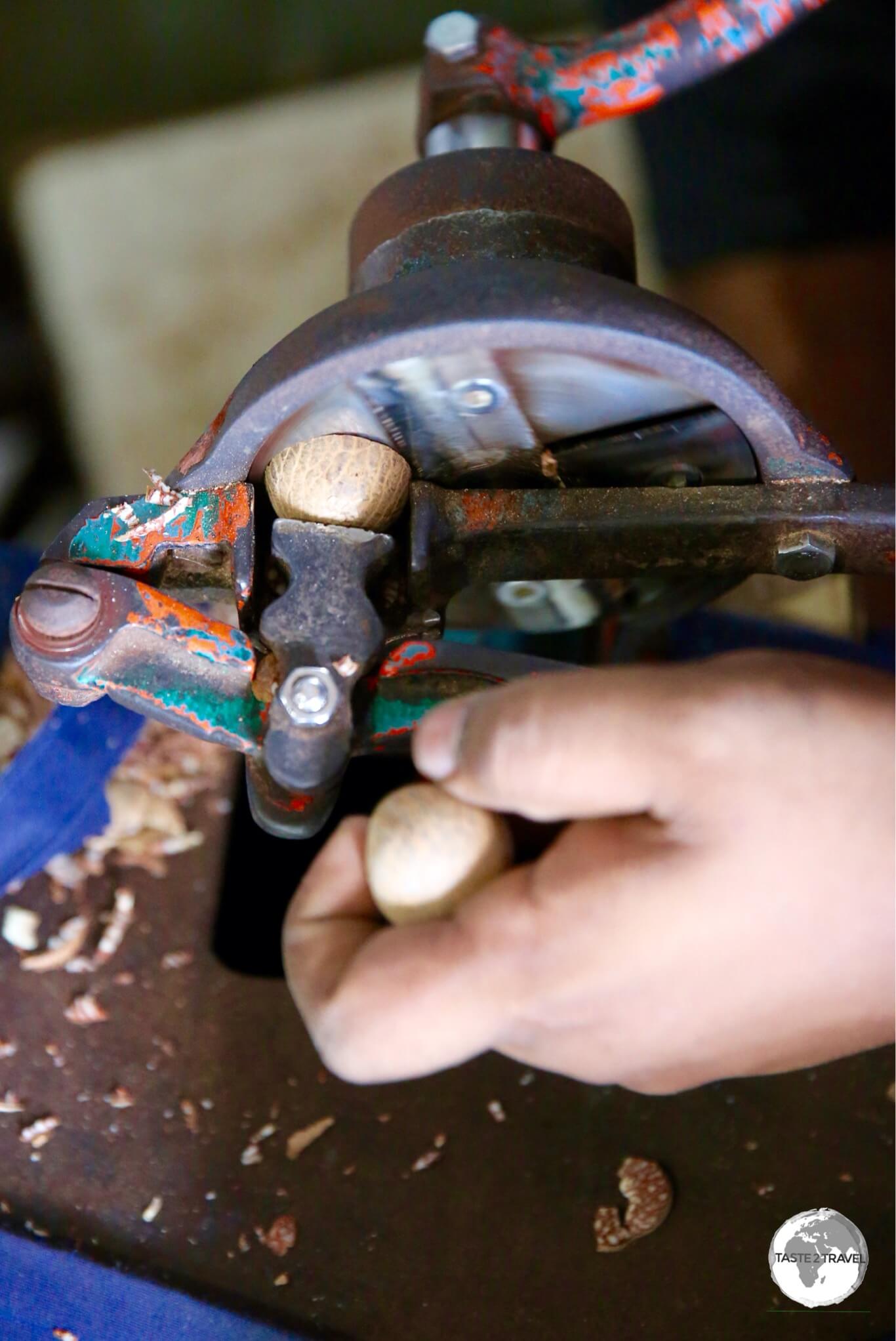 Areca nuts being sliced by hand a the central market in Malé.